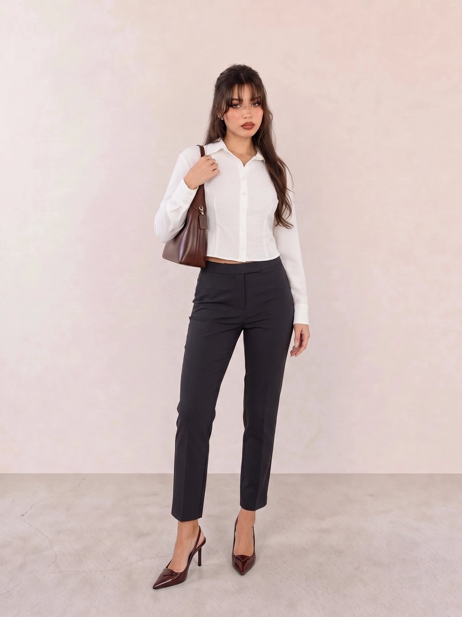 Old money look with ivory linen button-down shirt & black tapered trousers and burgundy slingback pointed heels