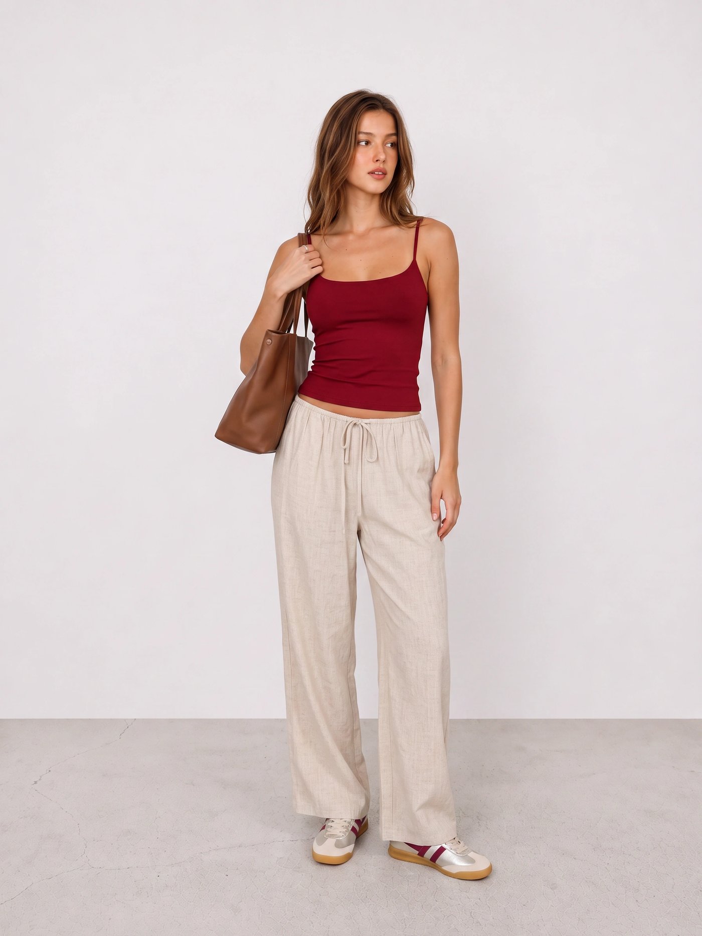 Burgundy Cami and Linen Trousers Travel Outfit