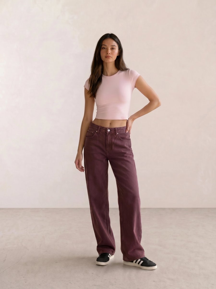 Basic casual outfit with a pink crop tee, burgundy wide-leg jeans, and black Adidas Campus sneakers