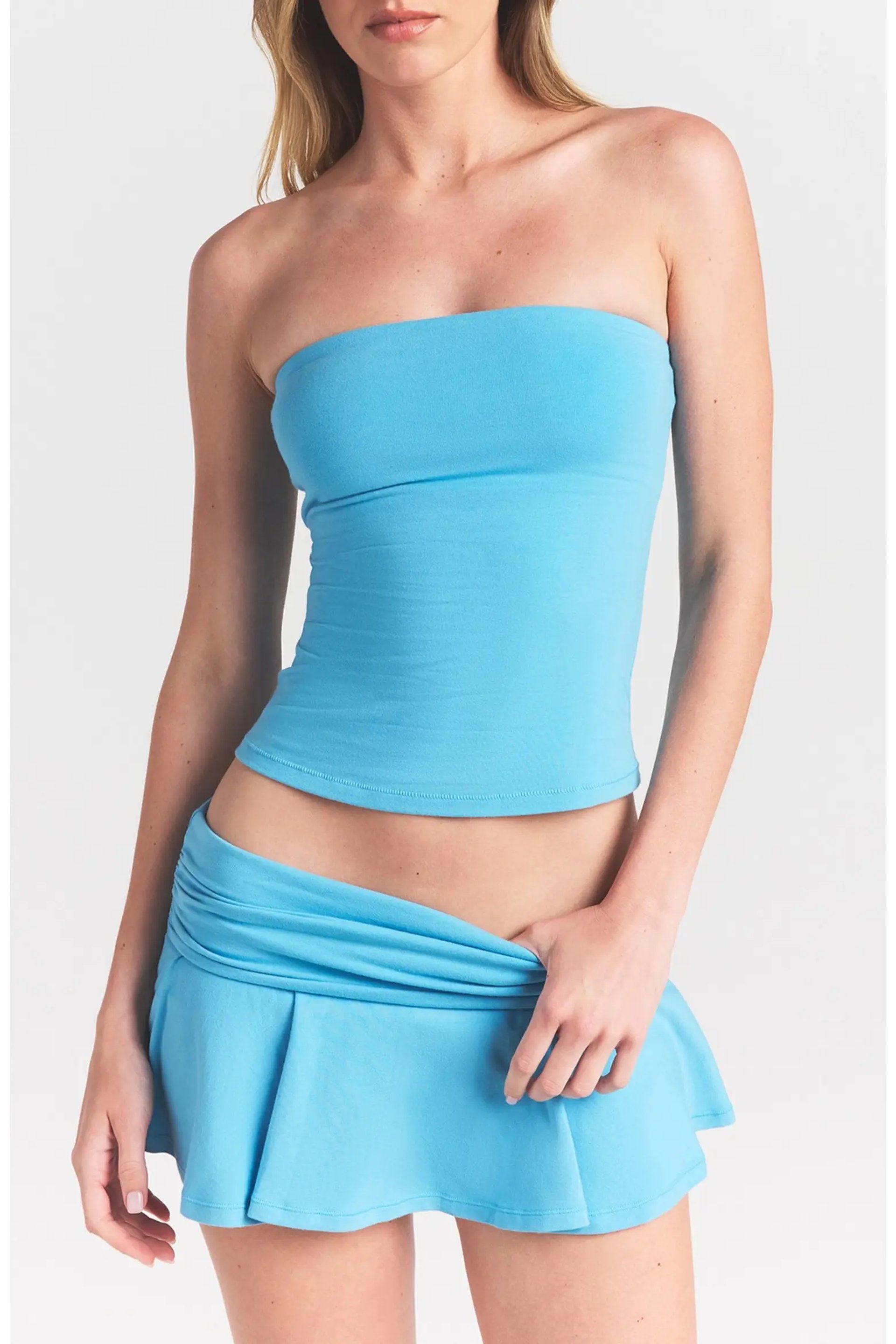 Turquoise strapless top with white crochet fringe mini skirt