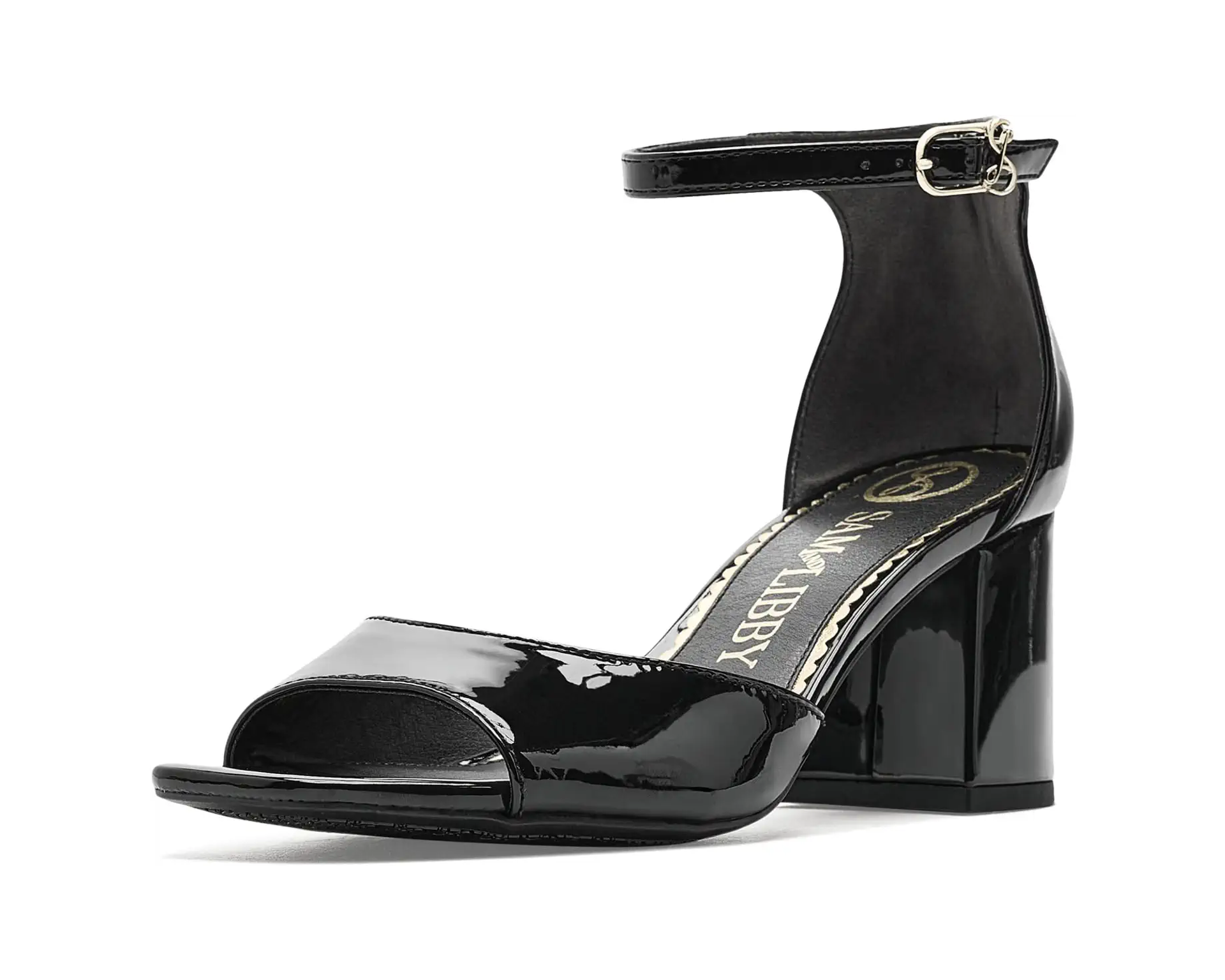 Black patent block-heel sandals styled with a sequin top and leopard print mini skirt