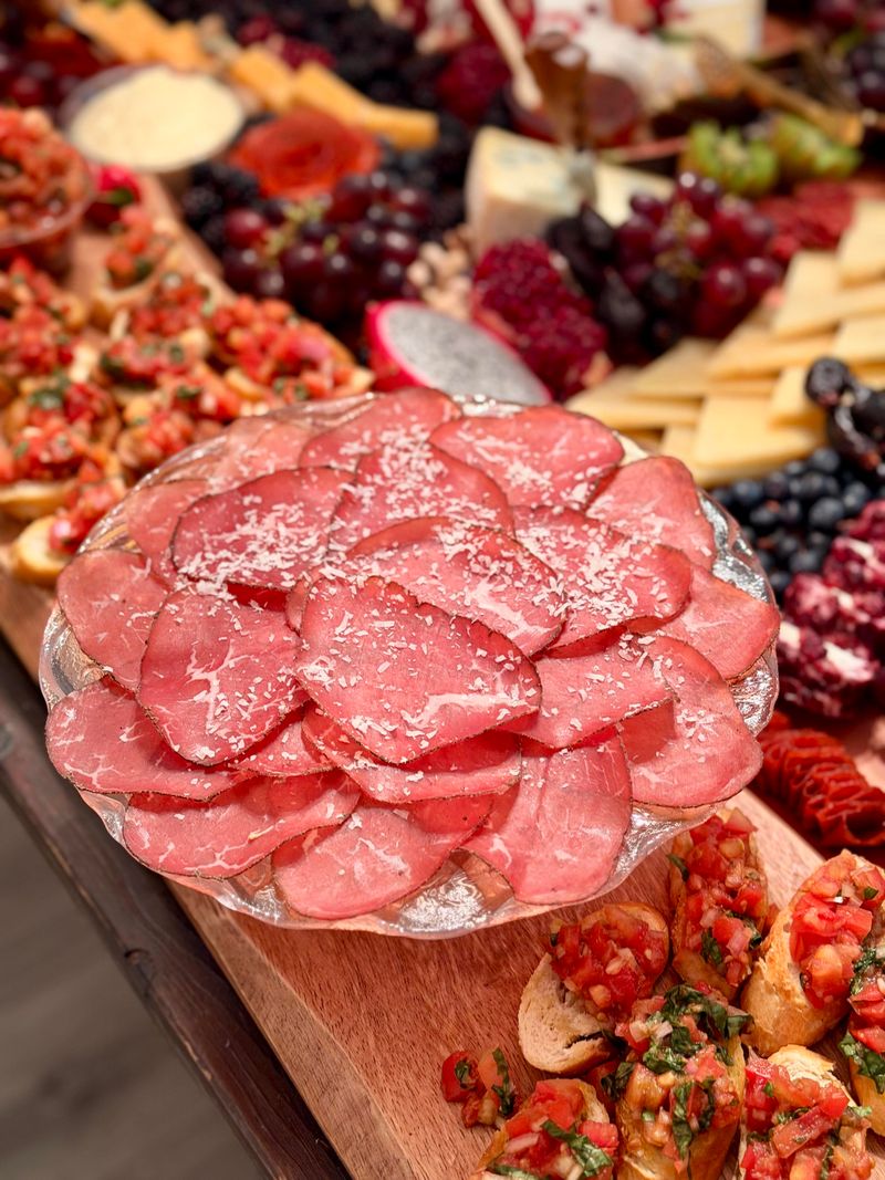 Artisan charcuterie board with cured meats and cheeses