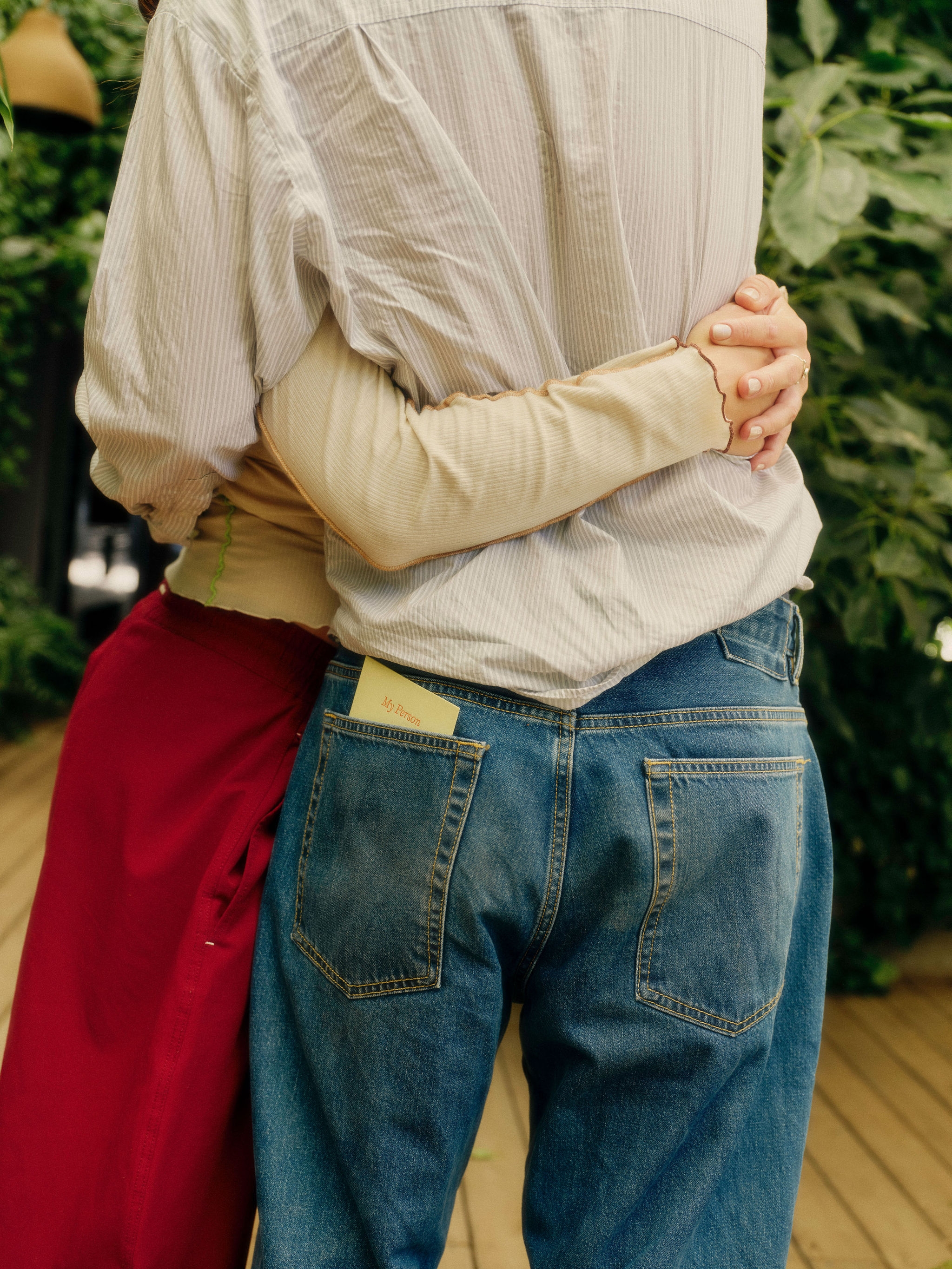 two people holding hands