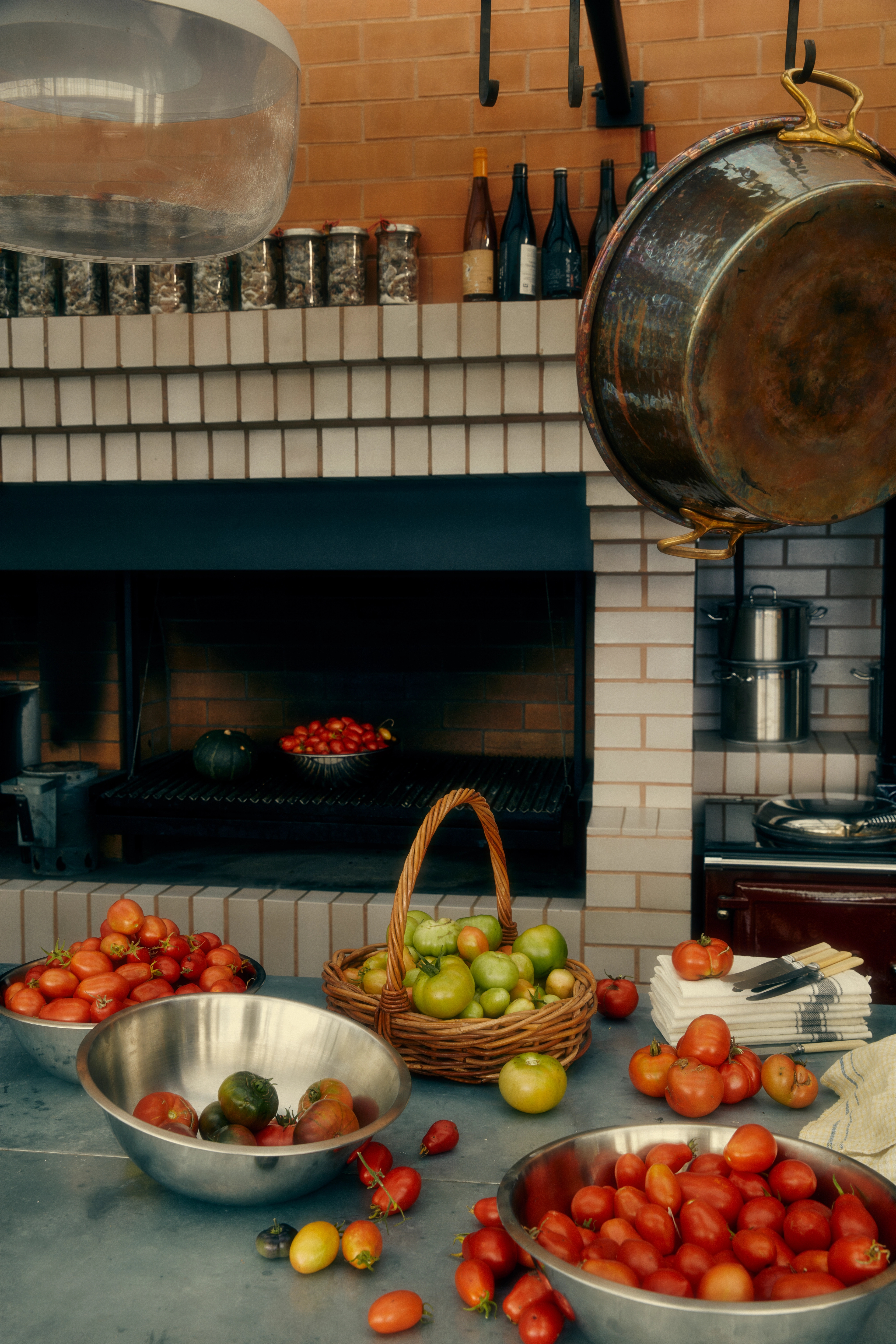 a kitchen table of tomatoes