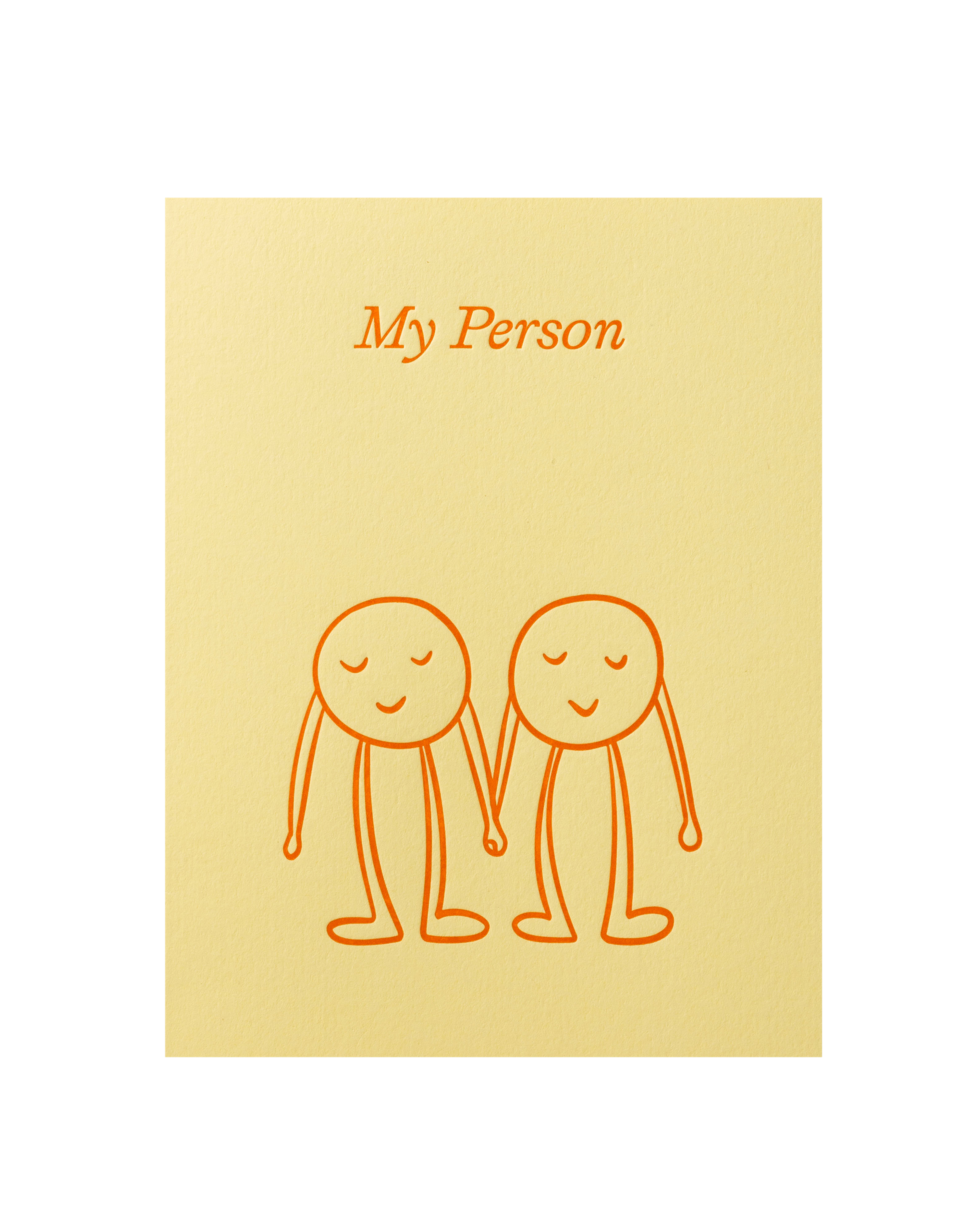 two people holding hands on a card