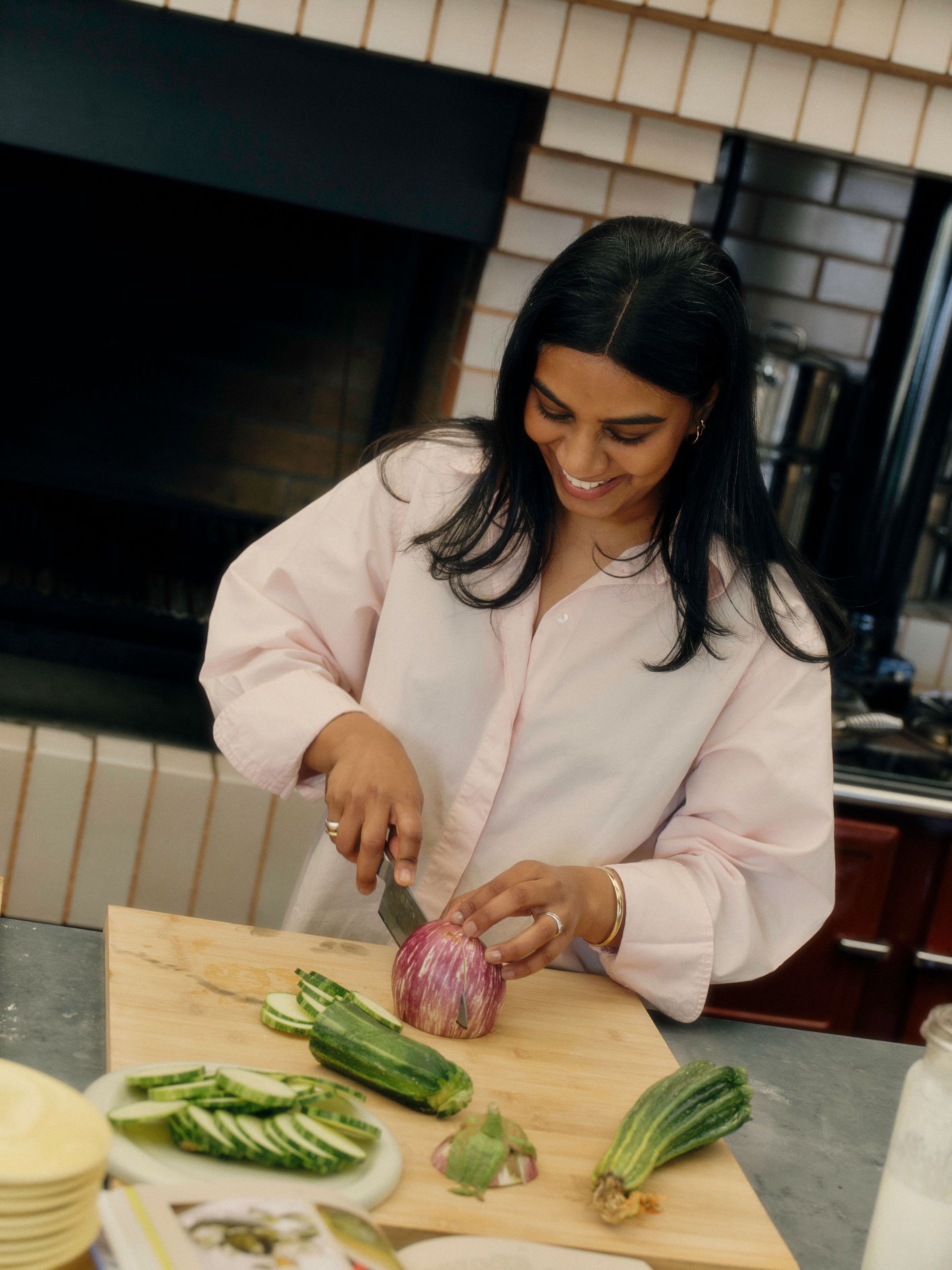 A beautiful green dresser drawer with various bedroom items