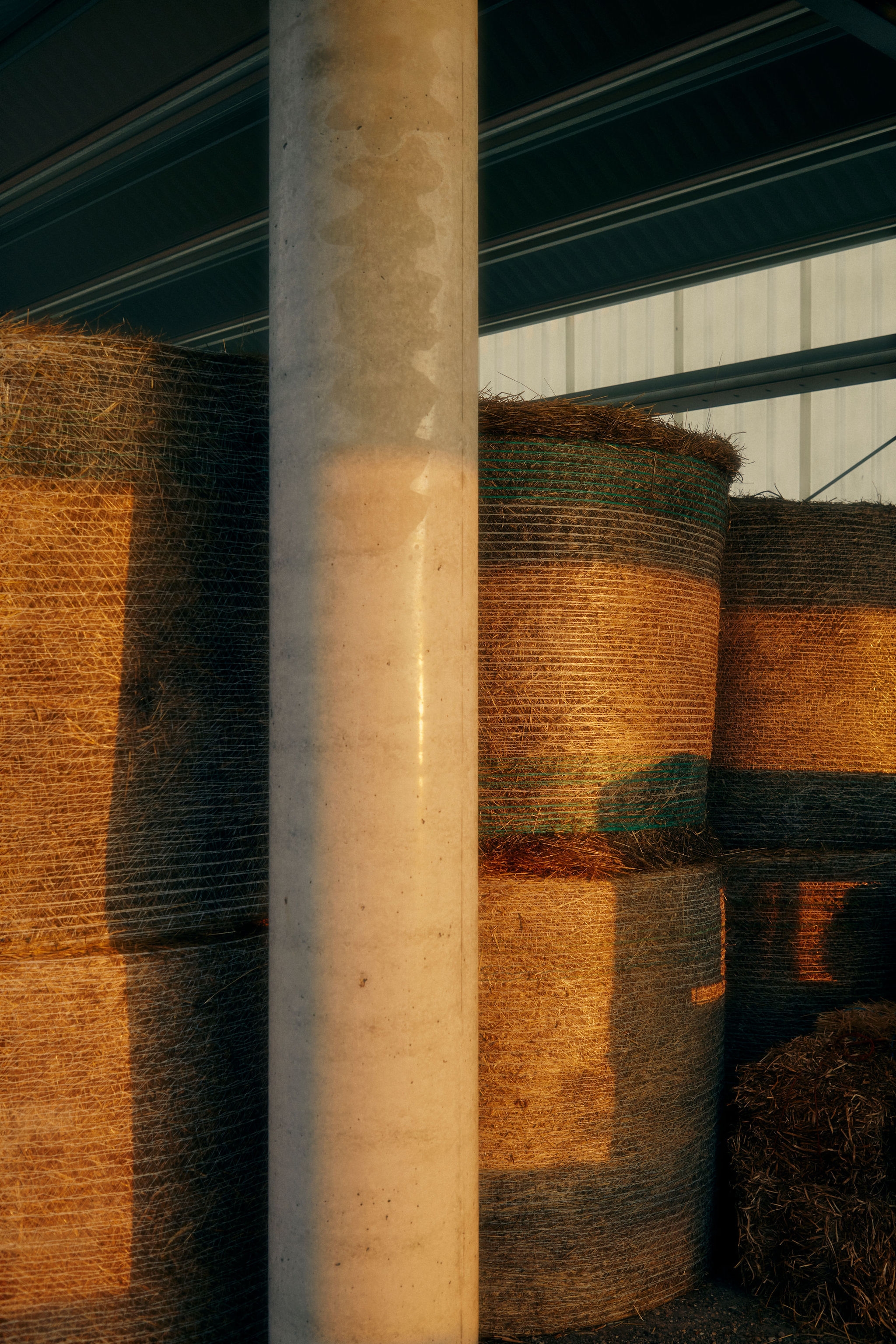 A brown dresser drawer against a red and pink wall