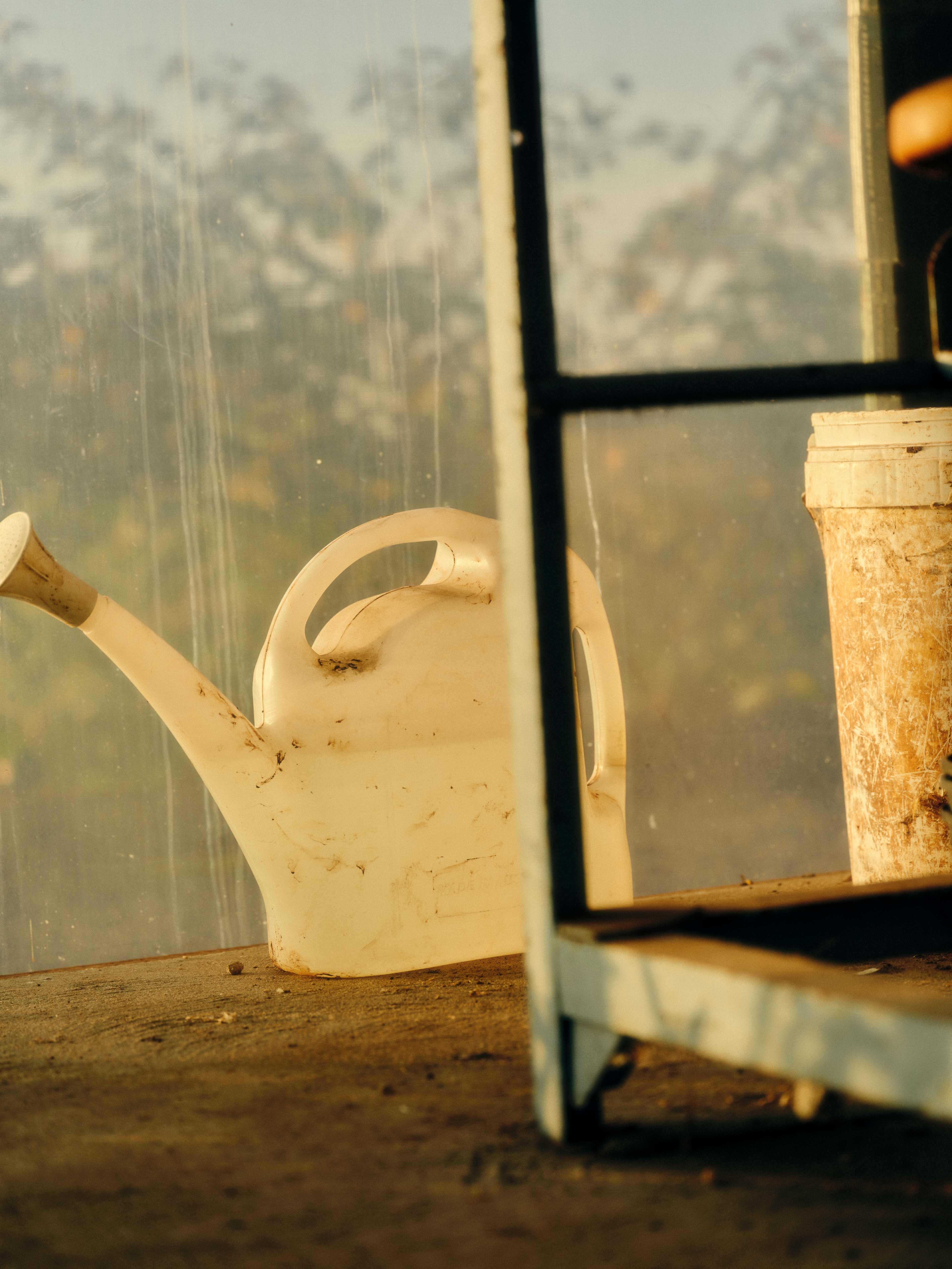 watering can on table