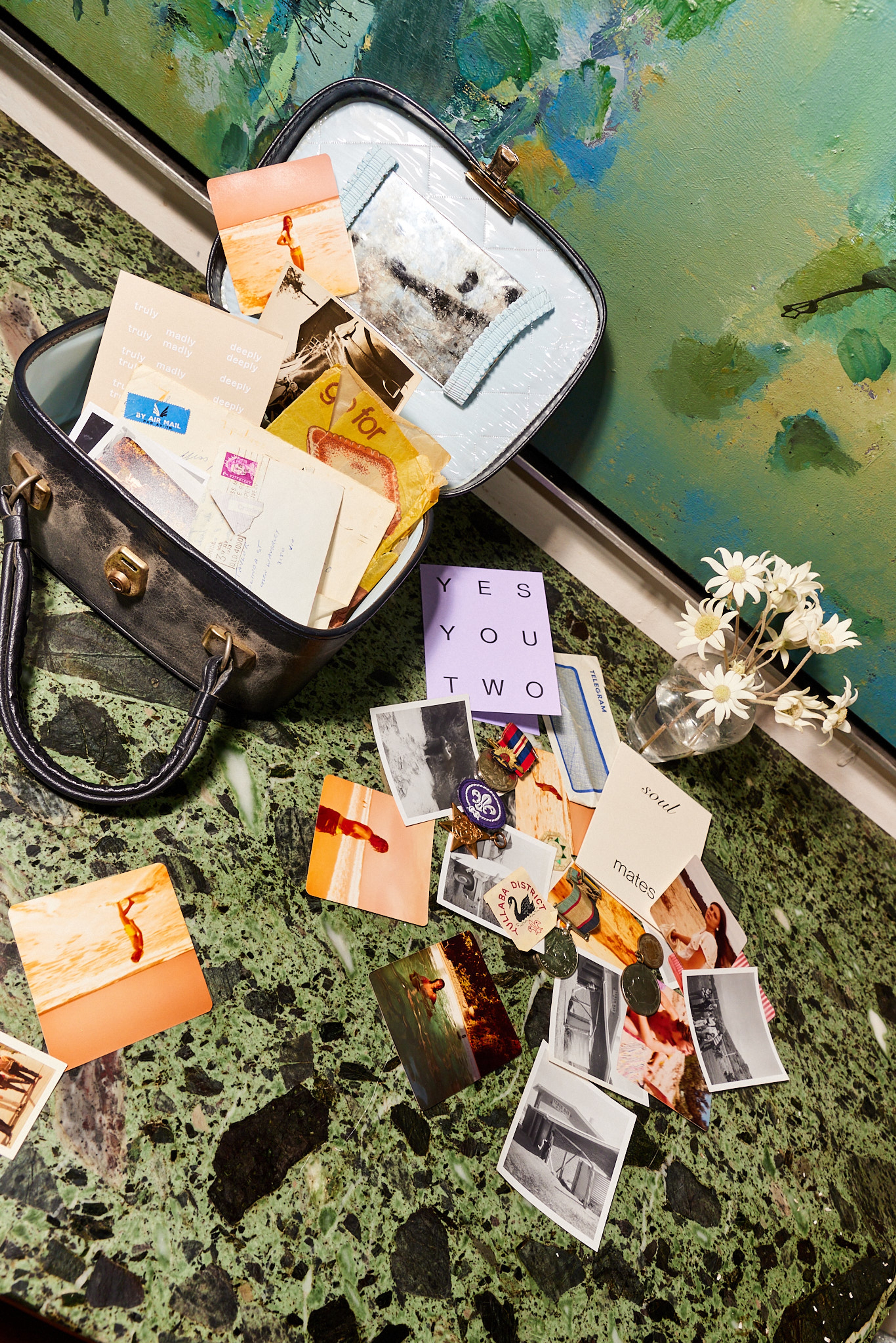 Old treasure box with cards, photos and treasures.