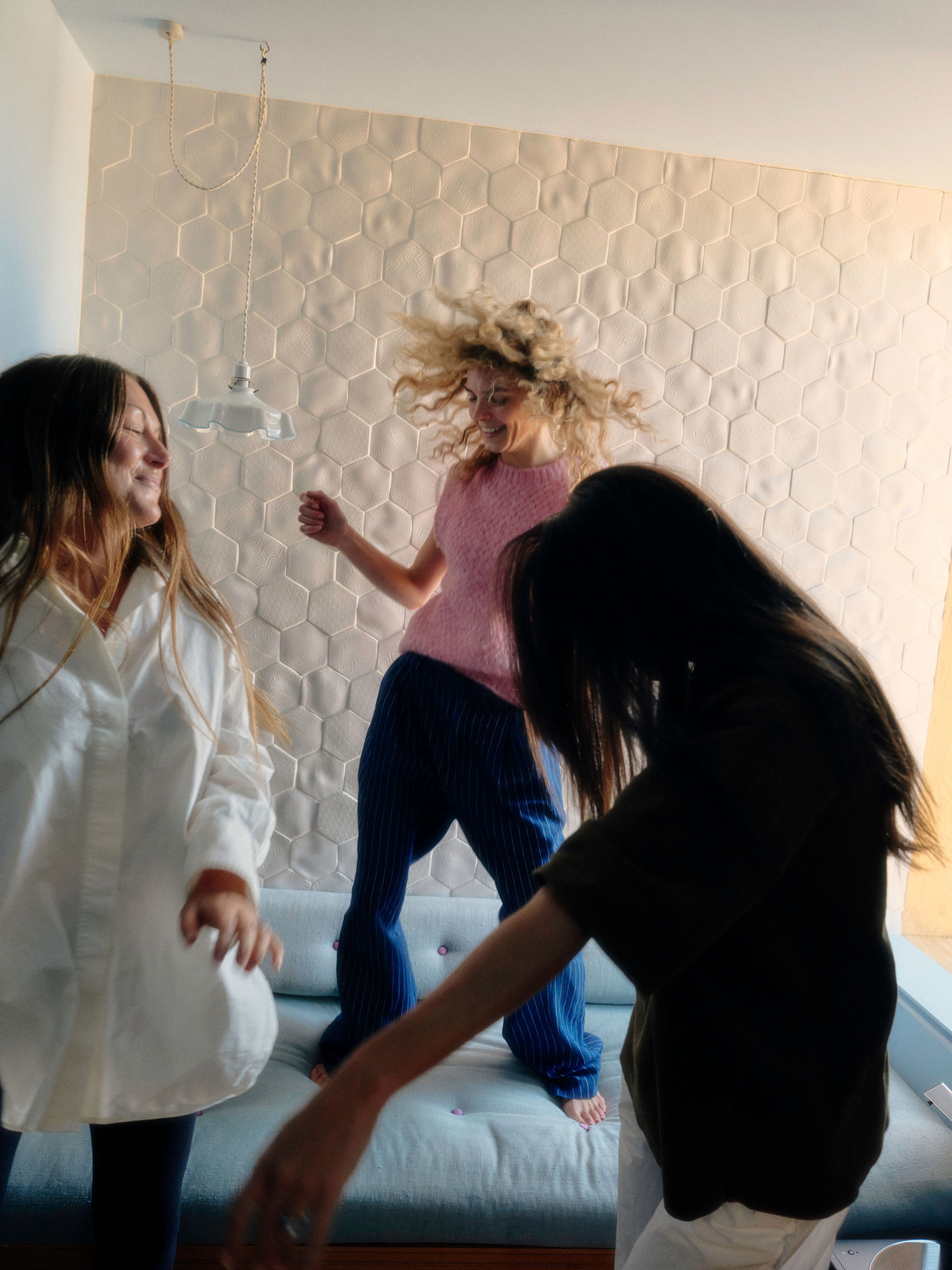 A cabinet full of glasses, plates and bowls