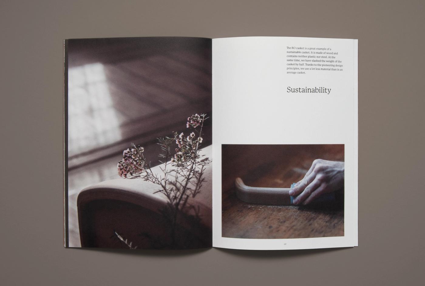 Spread from the Ro catalogue with a photograph of dried flowers on an upholstered chair in soft window light, and on the right the heading "Sustainability" above a photo of a hand resting on a wooden armrest.