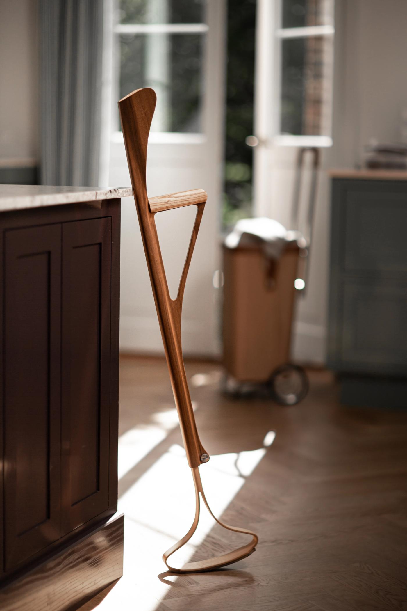 Lightweight molded-wood VÆRDIG rolling crutch by Anker Bak