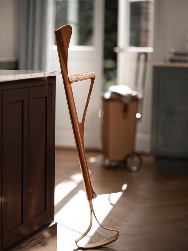 Lightweight molded-wood VÆRDIG rolling crutch by Anker Bak