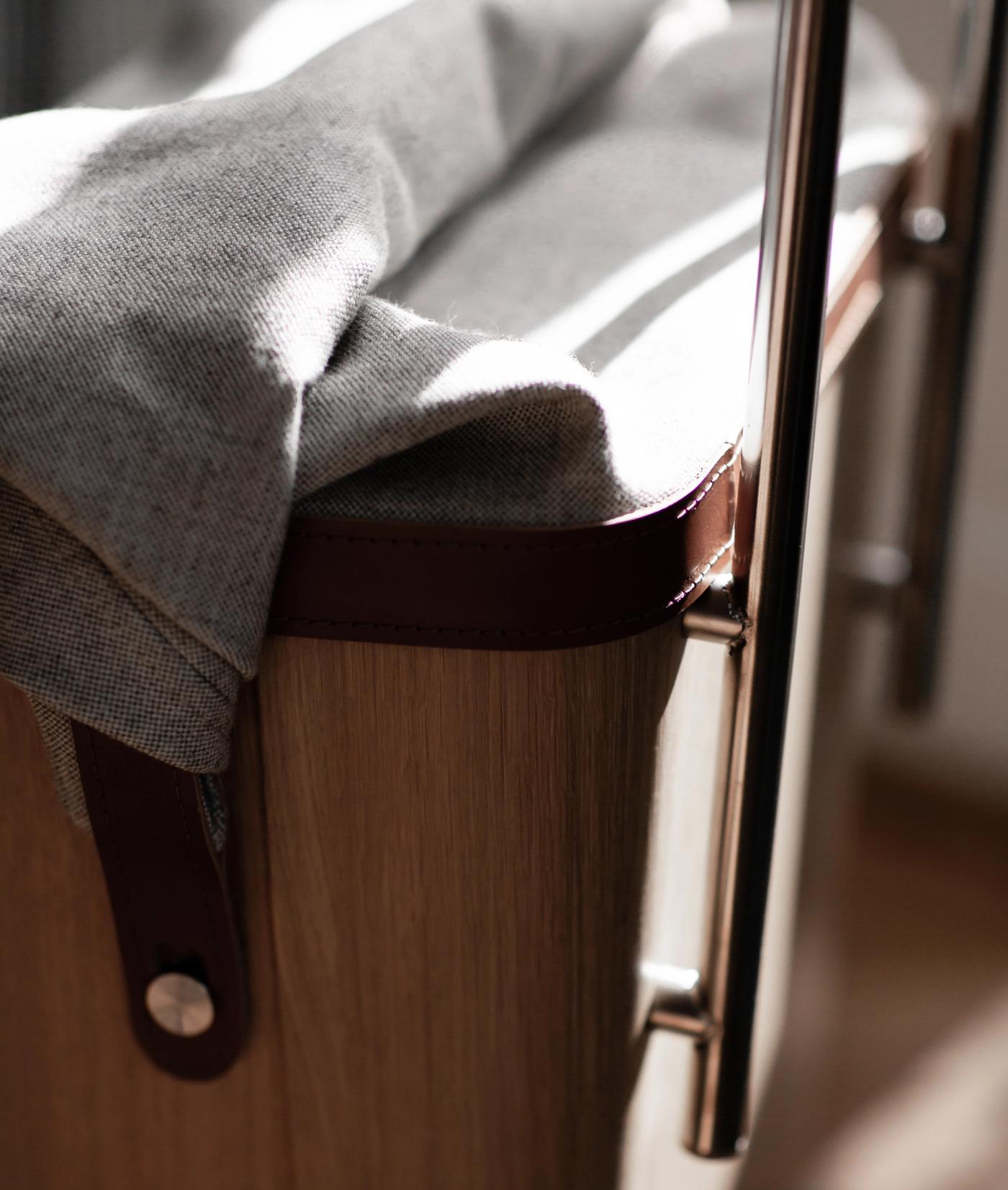 ÆRLIG molded oak trolley for indoor and outdoor use designed by Anker Bak