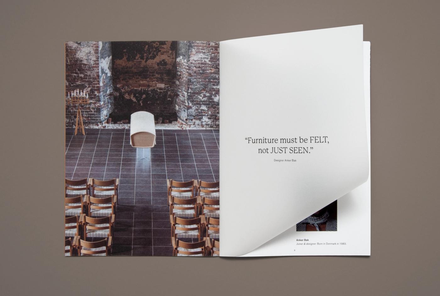 Open spread from the Ro catalogue with a photograph of rows of wooden chairs and a white Akari urn on a tiled floor in a brick hall, beside a page with the quote "Furniture must be felt, not just seen" and a portrait of Anker Bak.