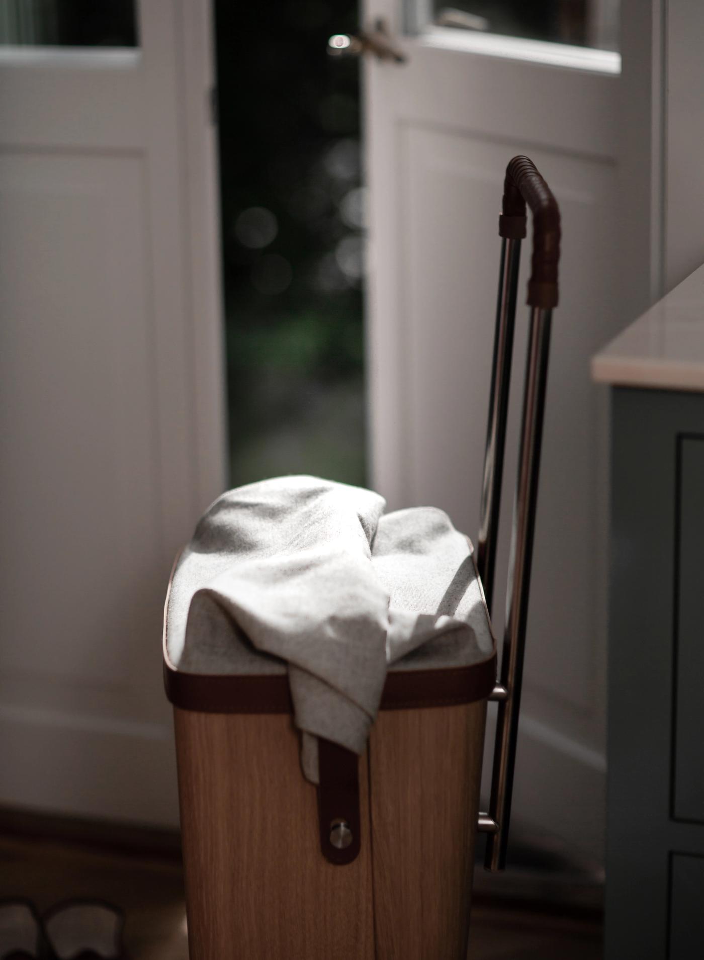 ÆRLIG molded oak trolley for indoor and outdoor use designed by Anker Bak