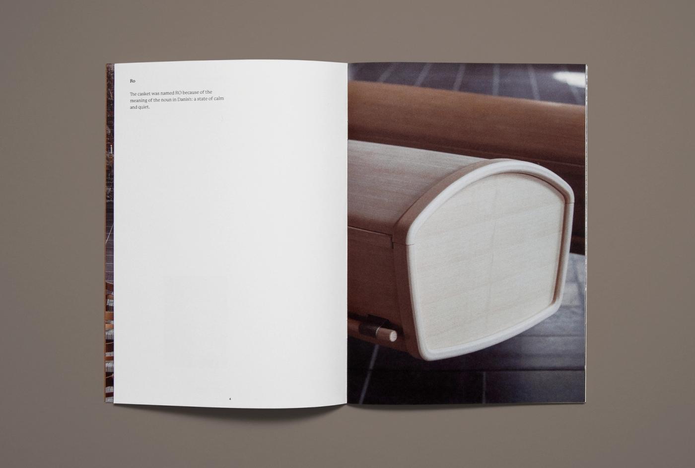 Open spread from the Ro catalogue with a mostly blank white left page and a close-up photograph of an oak armrest with a light upholstered panel on the right.