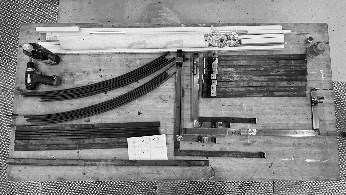 A photograph documenting the process behind the 'The Furniture We Need' exhibition at Ankerbak.