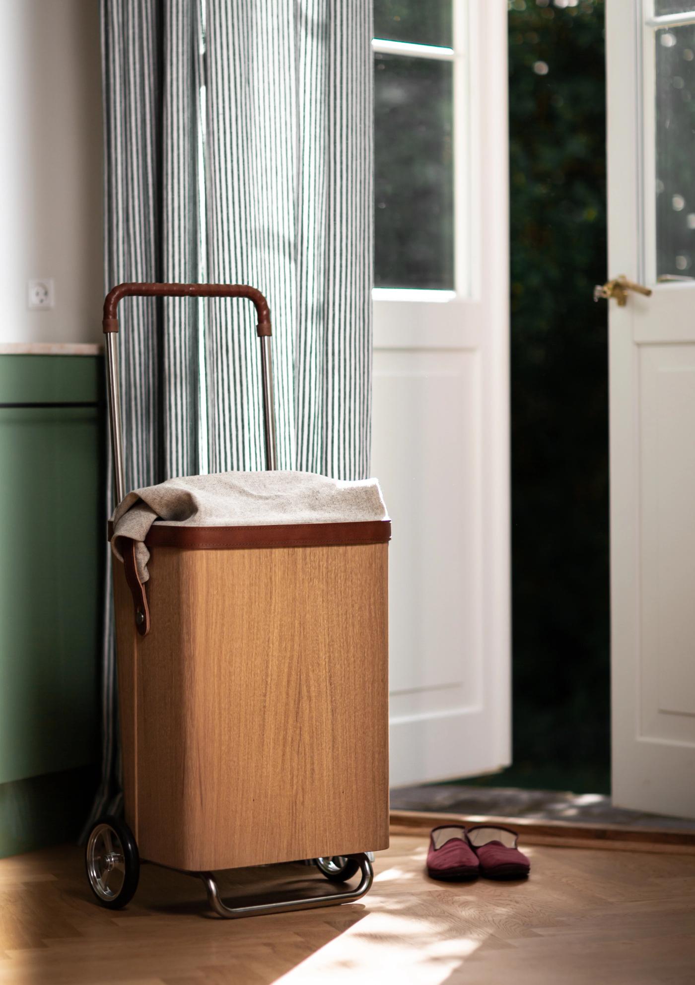 ÆRLIG molded oak trolley for indoor and outdoor use designed by Anker Bak