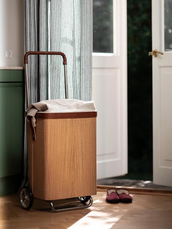 ÆRLIG molded oak trolley for indoor and outdoor use designed by Anker Bak
