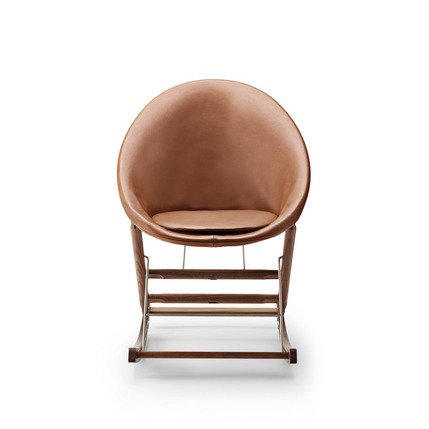 Rocking Nest Chair by Carl Hansen & Søn — a foldable rocking chair in walnut wood with a suspended canvas seat and steel cable details, shown in profile on a white background.