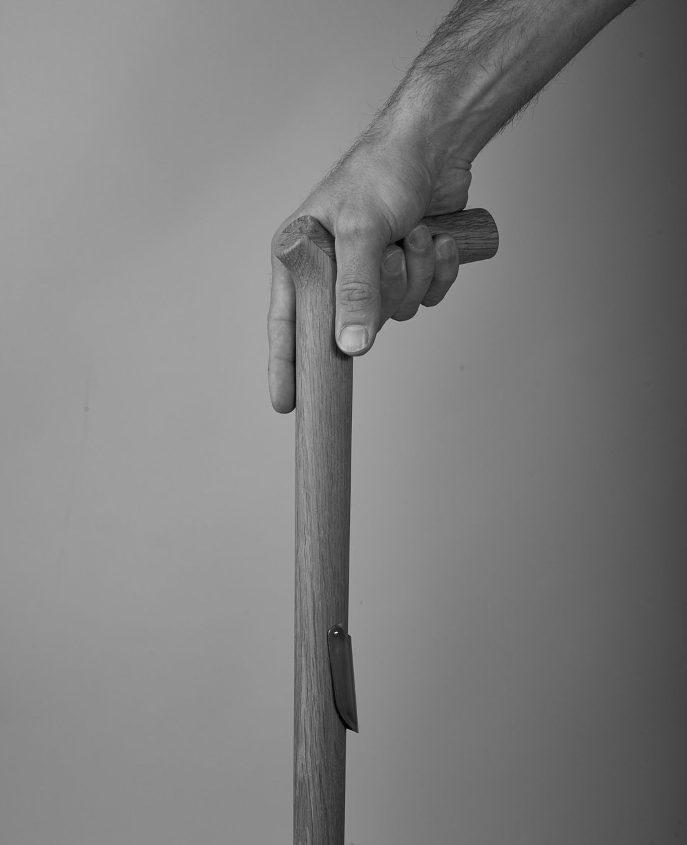 Nyttig functional oak cane with ergonomic handle designed by Anker Bak