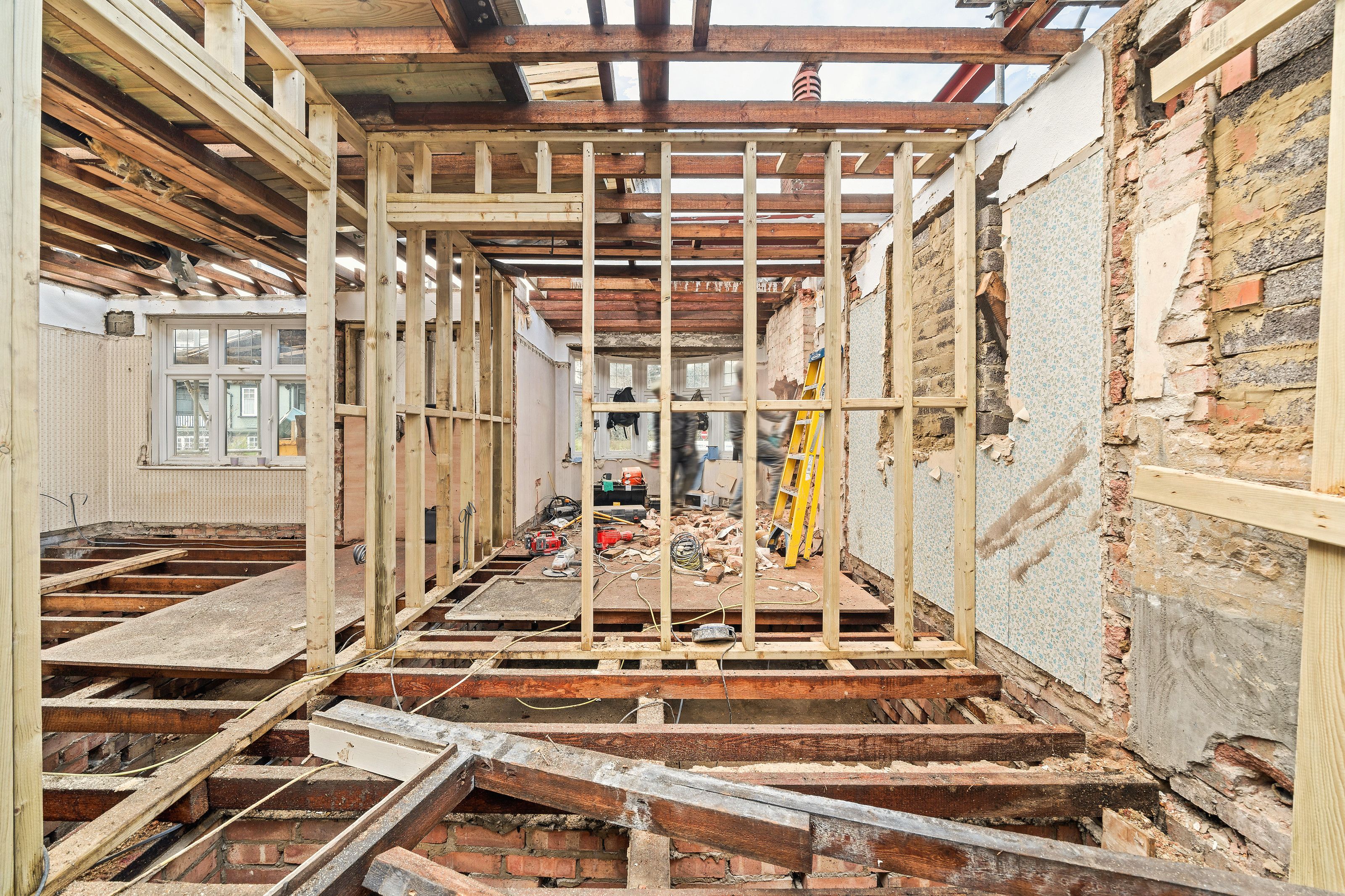 New timber stud walls framing out the rooms inside the stripped bungalow