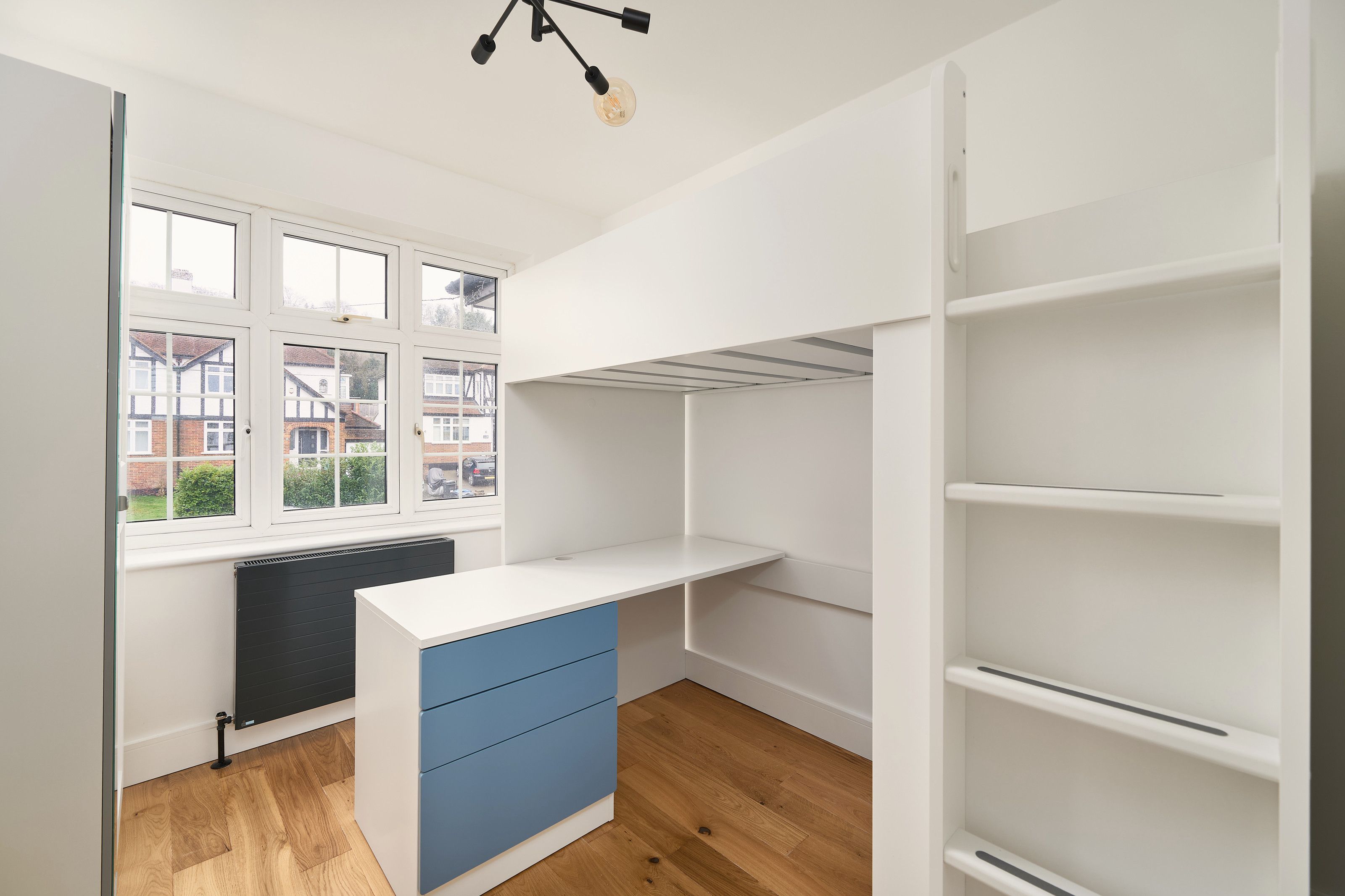 Bedroom with built-in desk after the work
