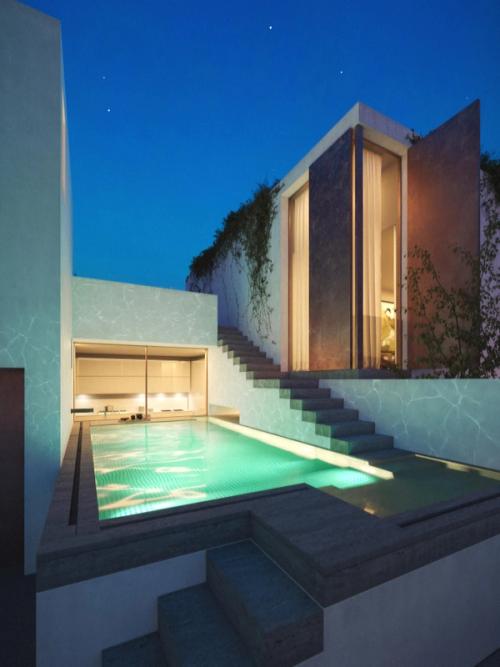 The pool is positioned as to visually and physically conjoin the different parts of the house together. The external stairs directly bind the pool with the mast...