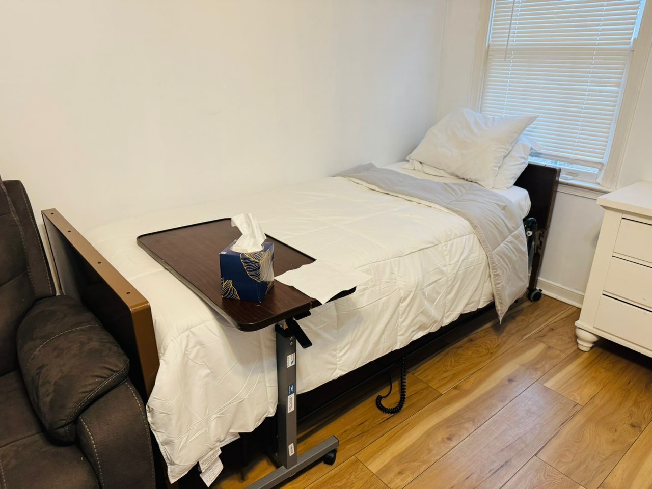 Cozy private bedroom with personal touches and natural light