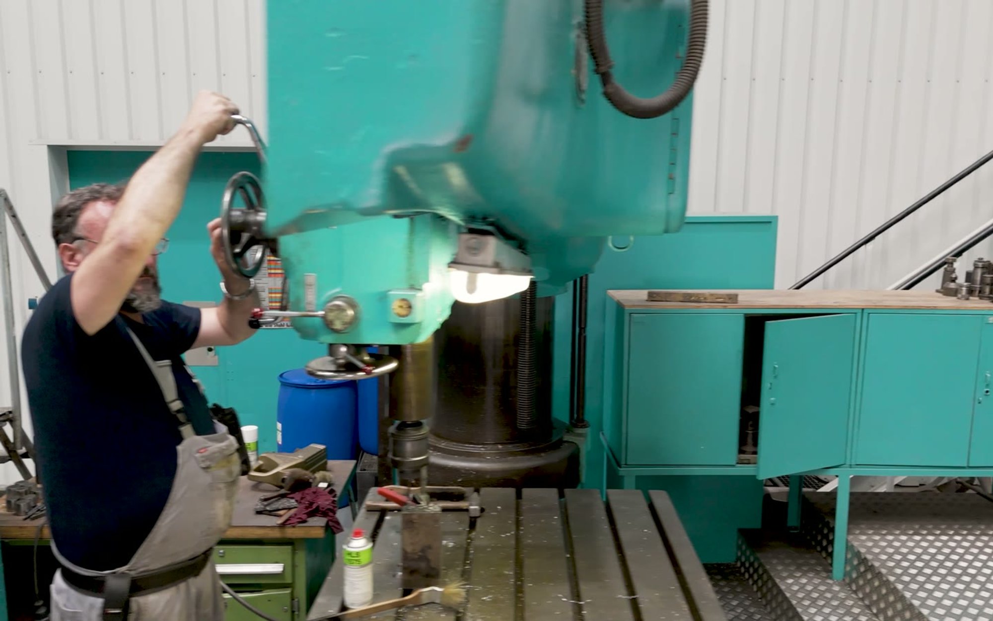Still from the refit stand film, a machinist at work in the Lürssen yard