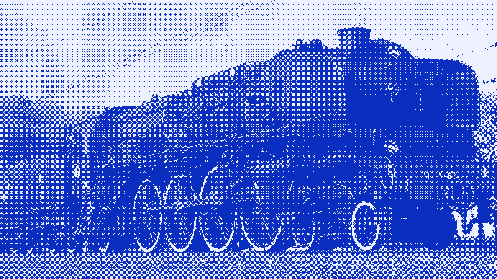A steam locomotive in profile, its driving wheels and coupling rods catching the light.