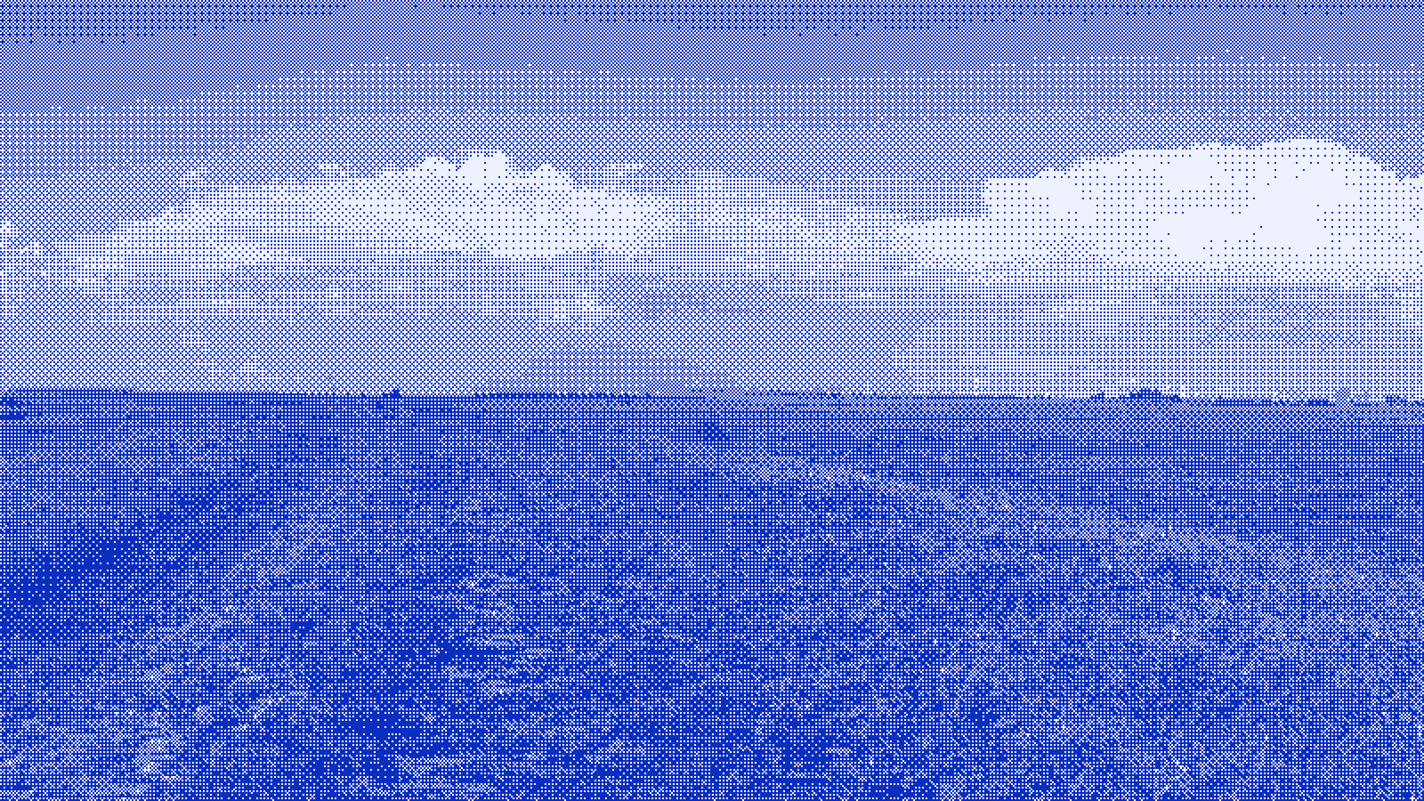 A bank of storm cloud spread across the sky above a dark, open field.