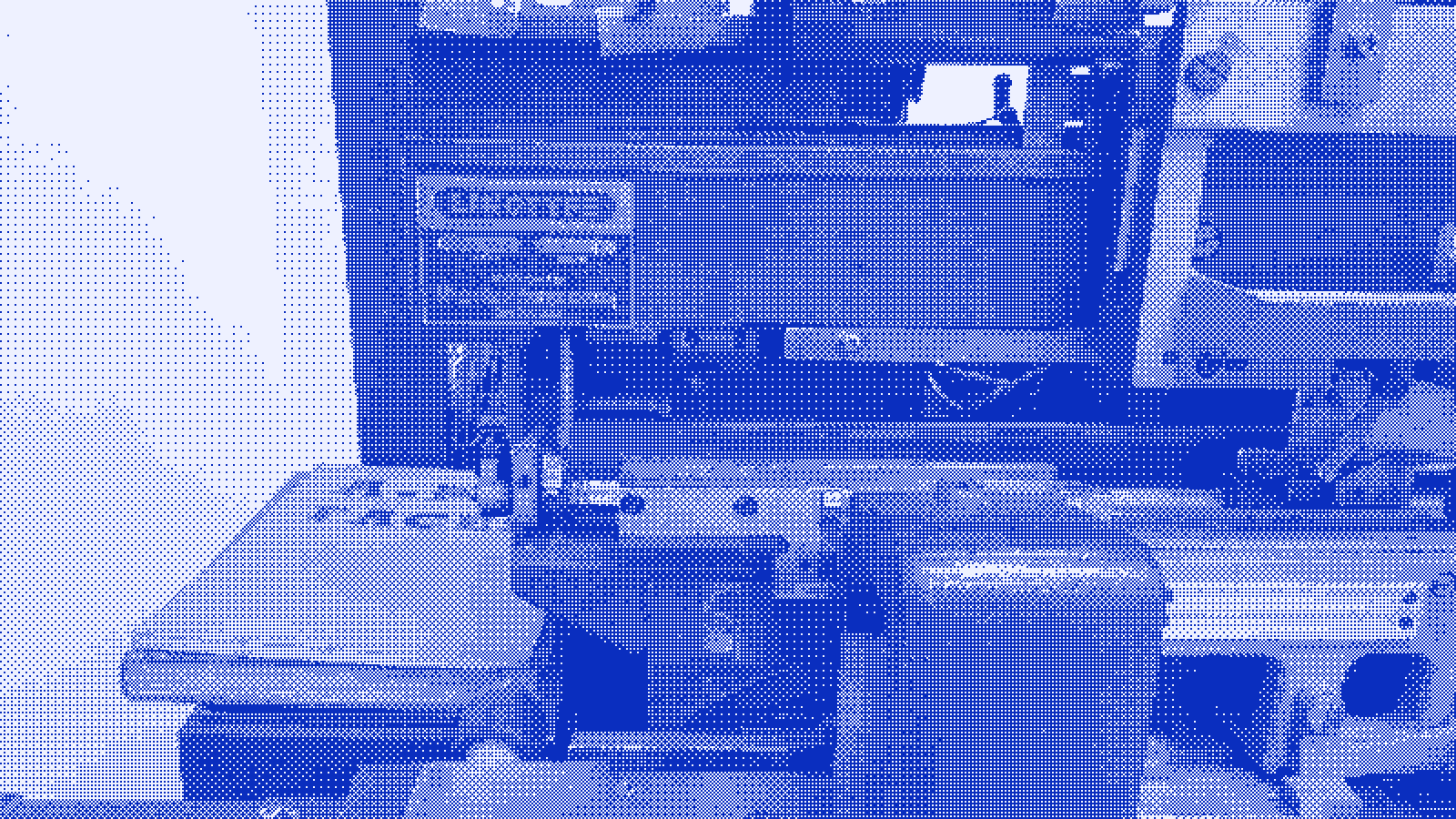 A Linotype typesetting machine seen close up, its castings and levers filling the frame.