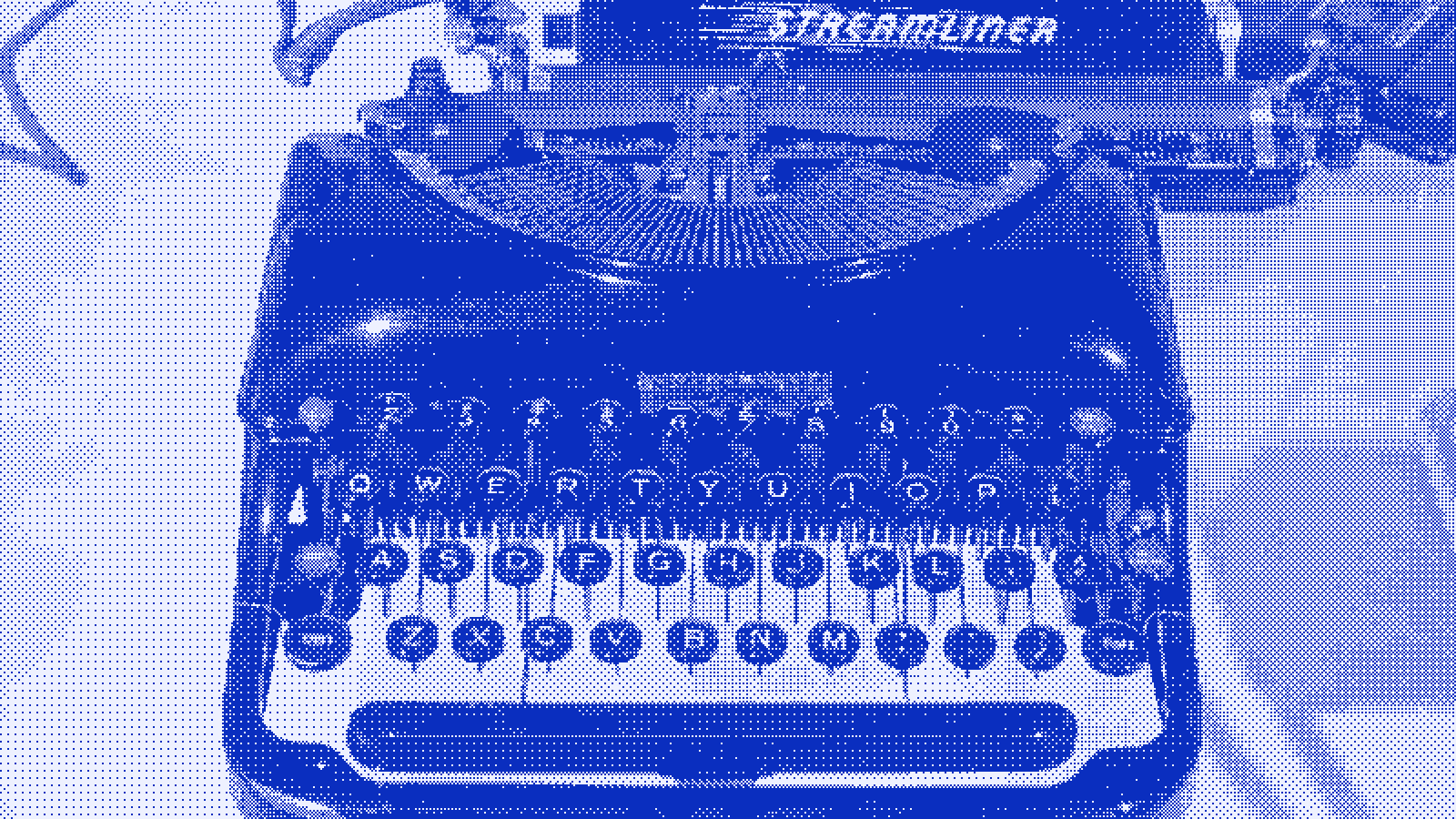 A portable manual typewriter photographed head-on, keys and carriage in view.