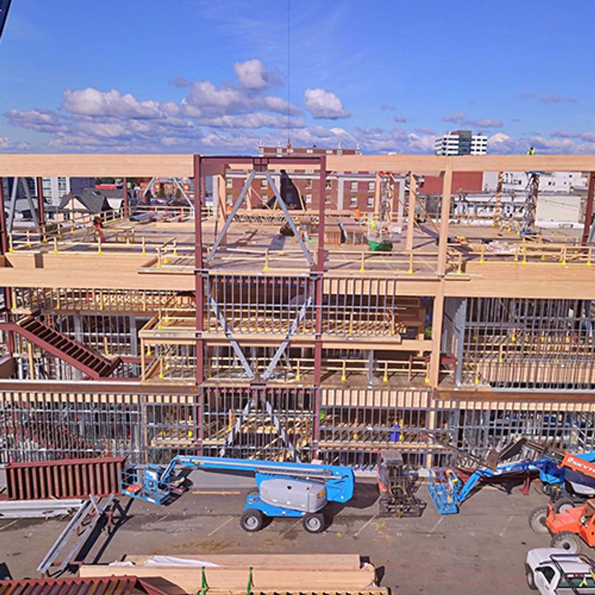 Timber beams and exterior framing before the building was enclosed