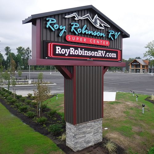 Roadside sign and landscaped entrance