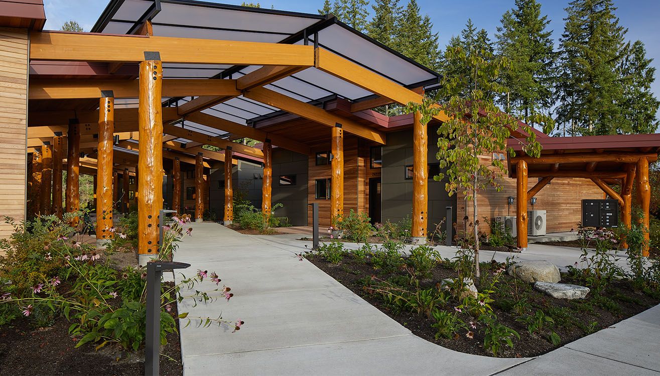 Landscaped entry to the covered residential walkway