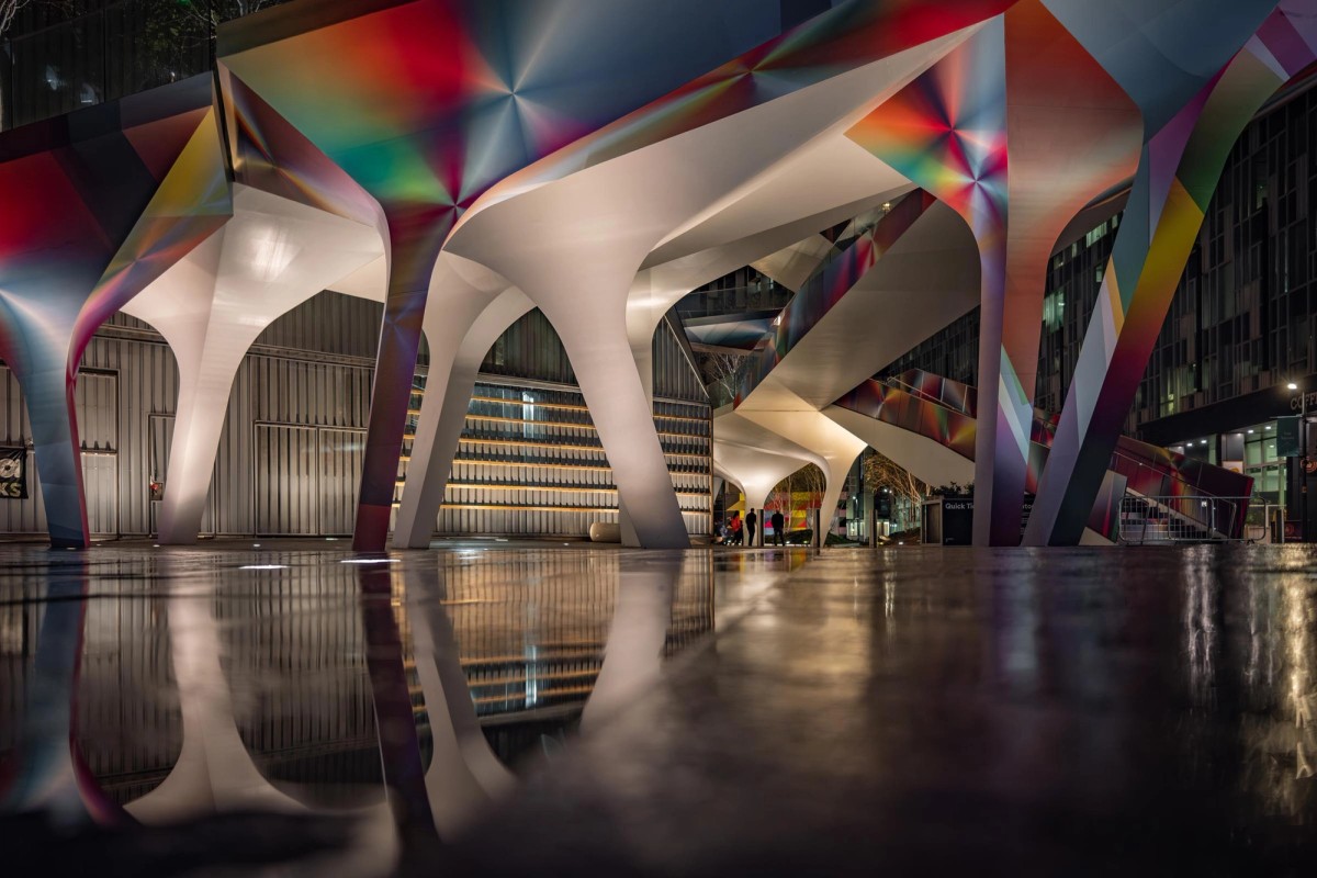 Non-geometric colour building reflecting in the rain