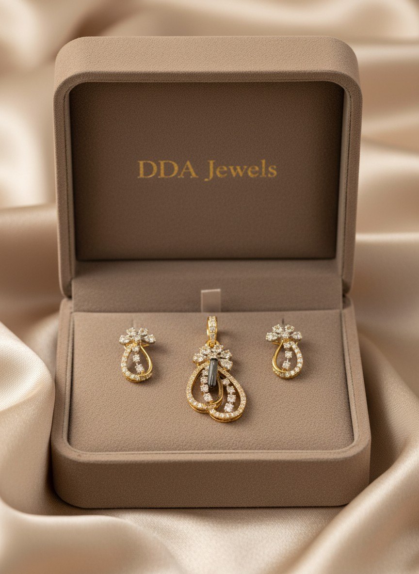 Swirl teardrop diamond pendant set with matching earrings