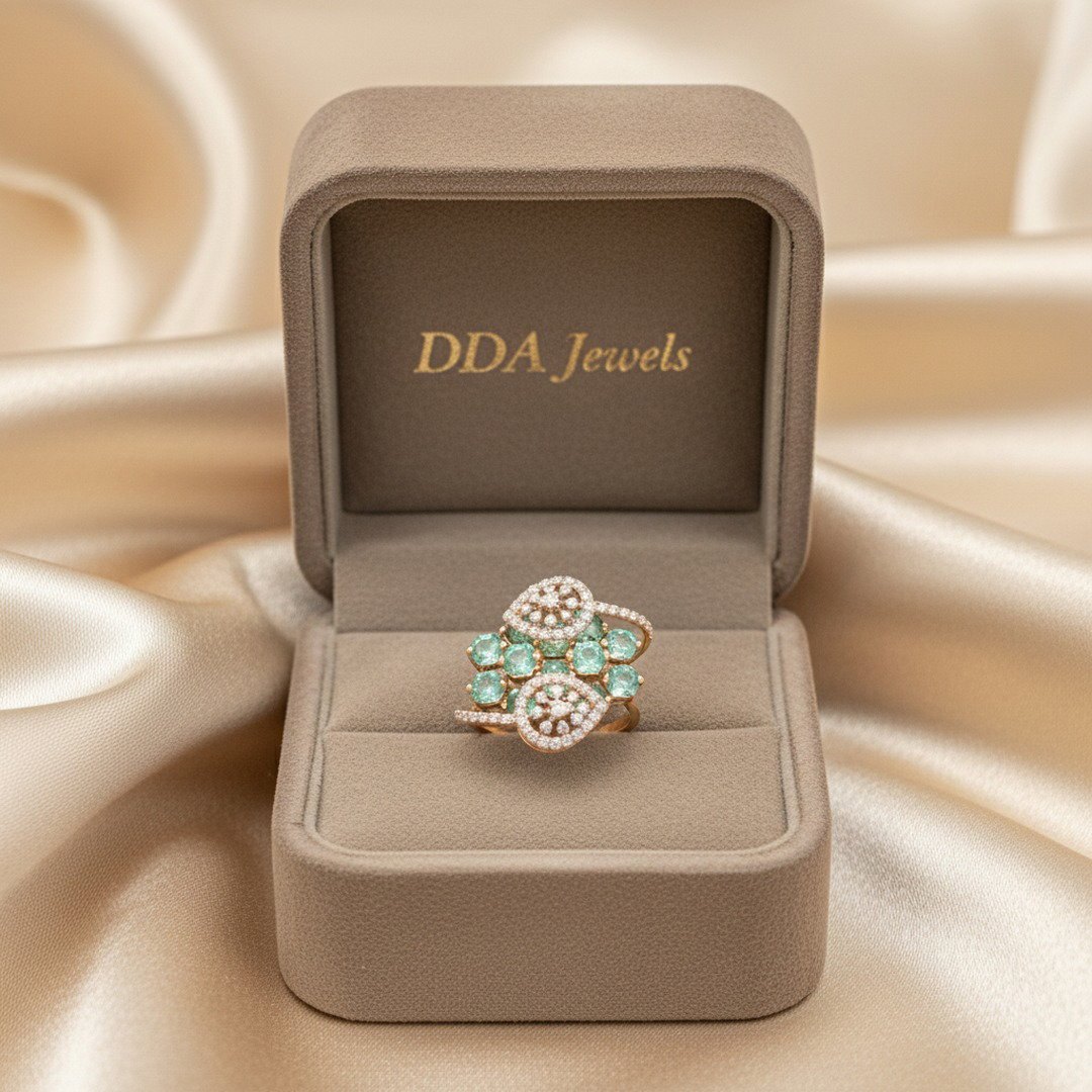 Emerald-tone round halo diamond ring