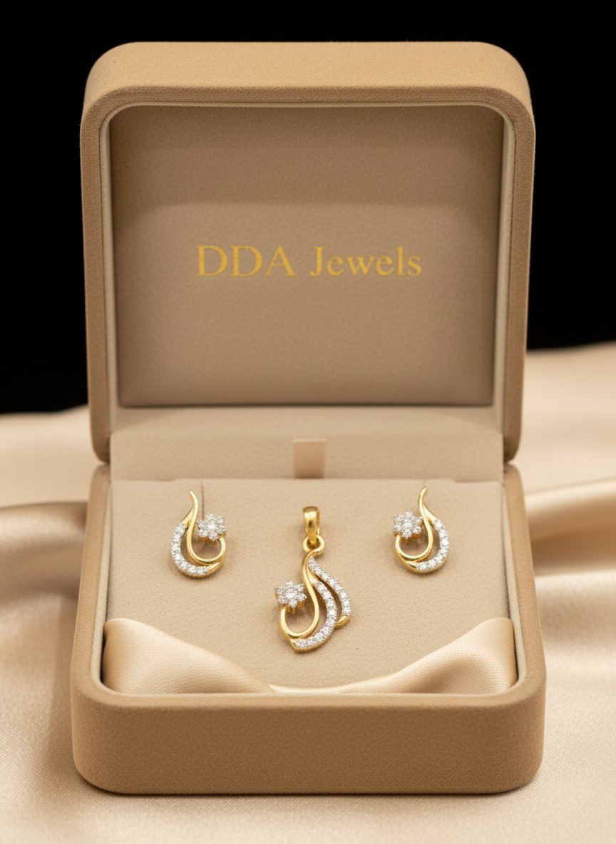 Crescent drop diamond pendant set with matching earrings