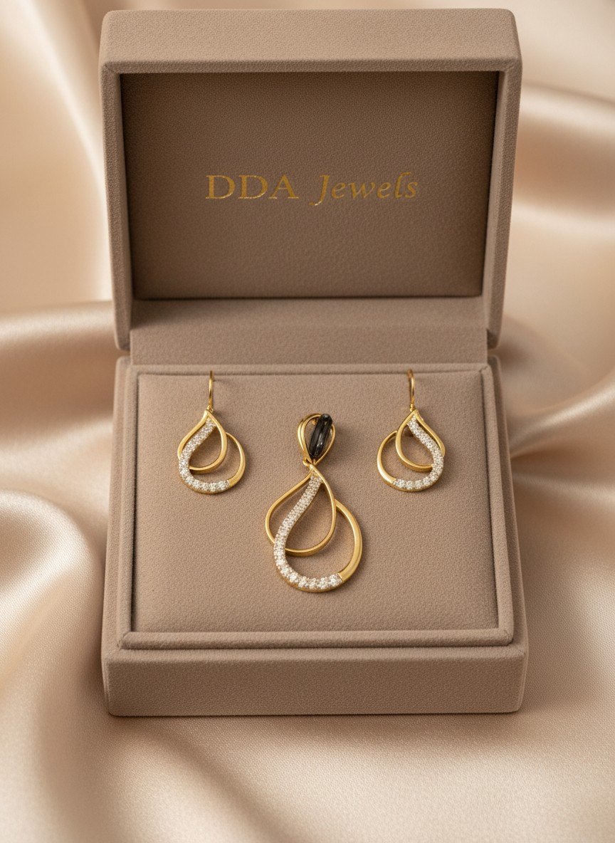 Open pear diamond pendant set with matching earrings