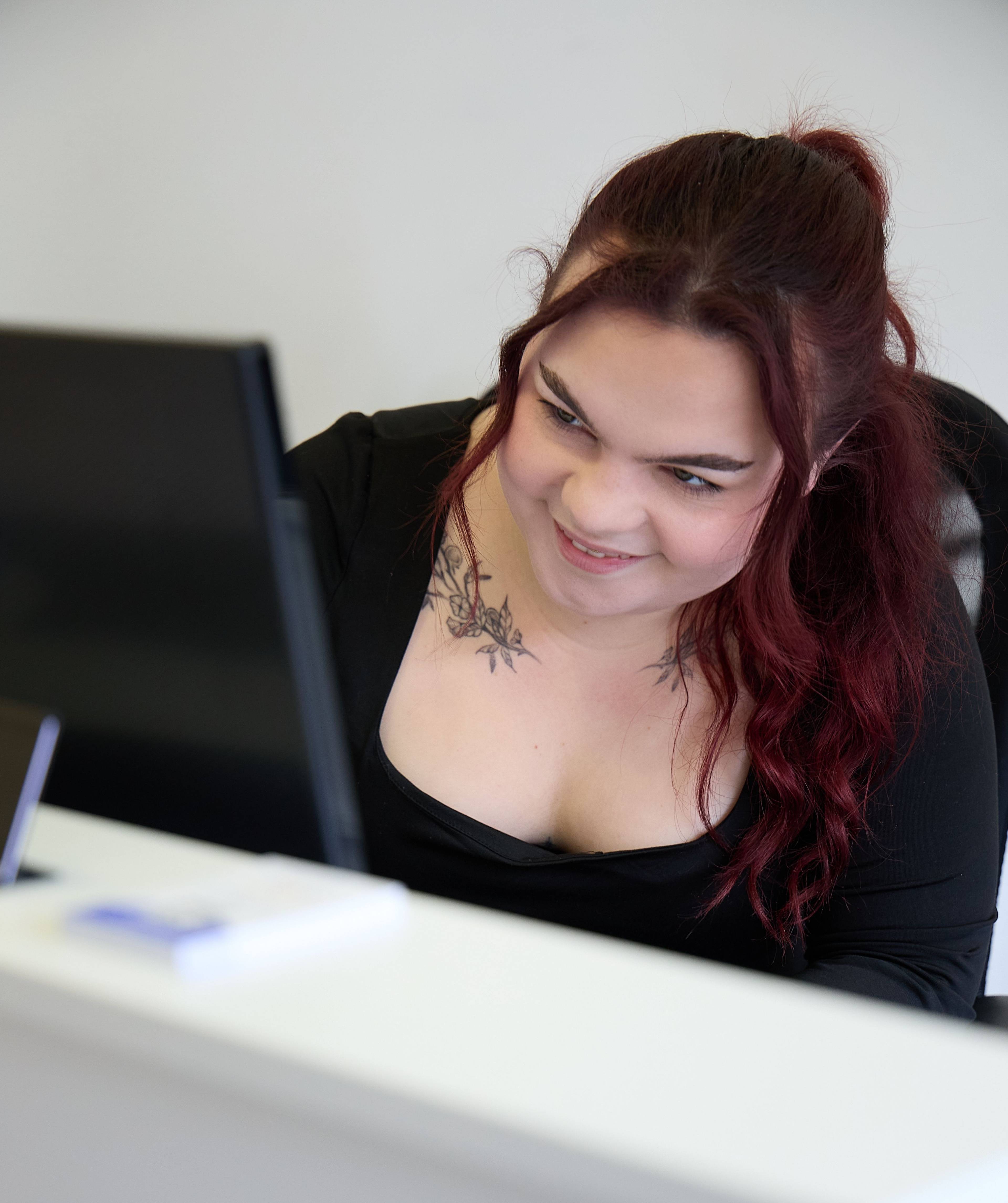 Our receptionist smiling at the front desk