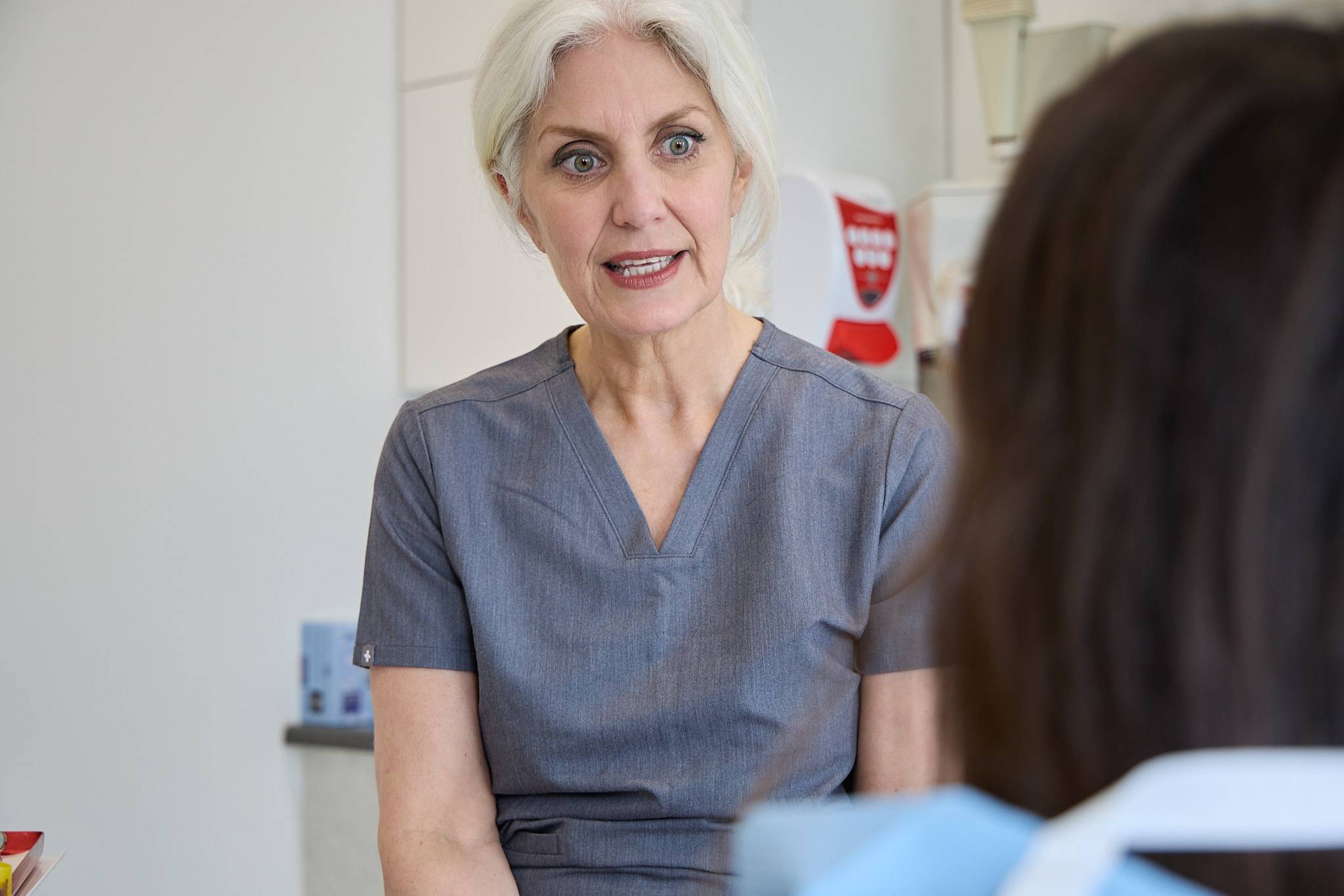 Cathy Barber consulting with a patient