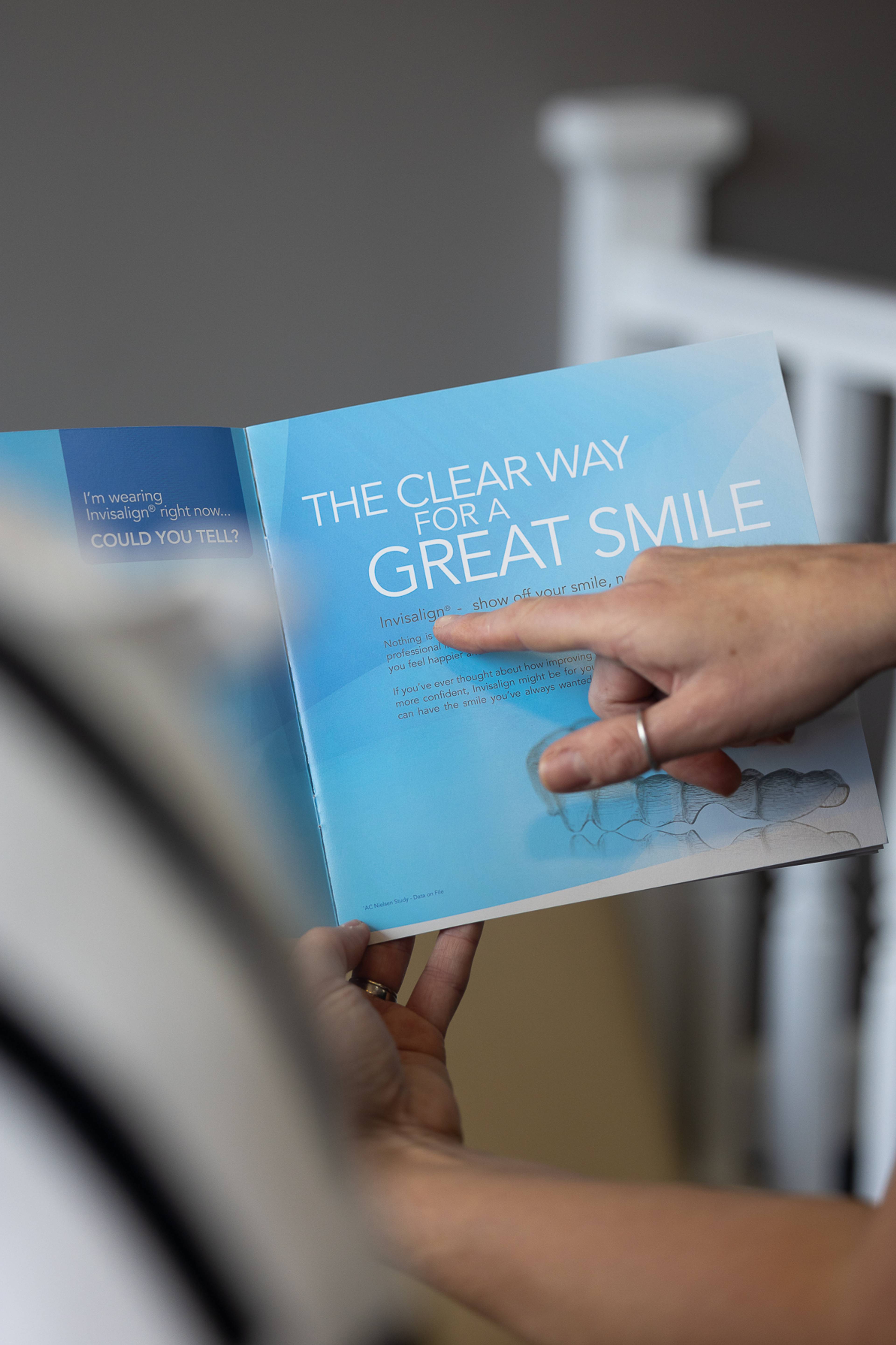An Invisalign leaflet that is being shown to a patient
