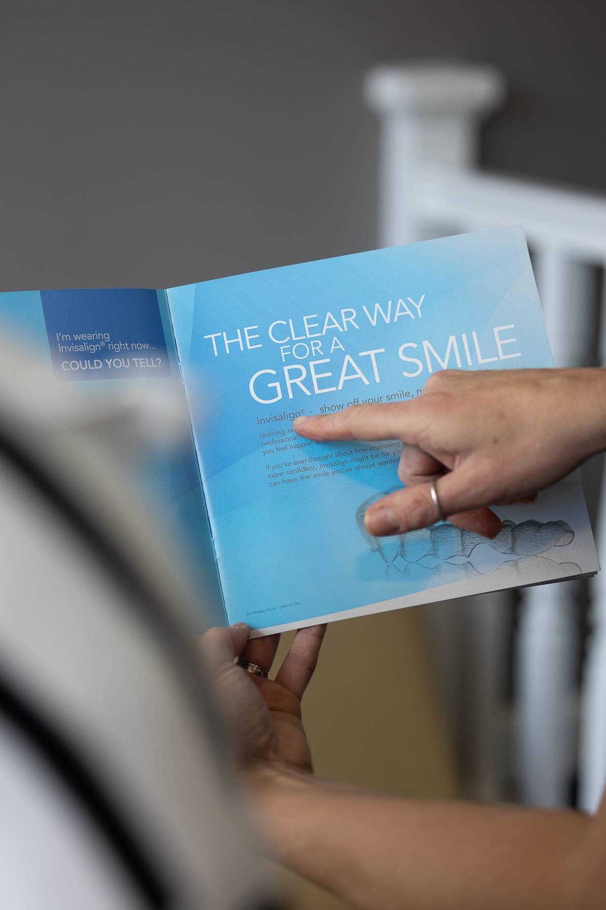 An Invisalign leaflet that is being shown to a patient
