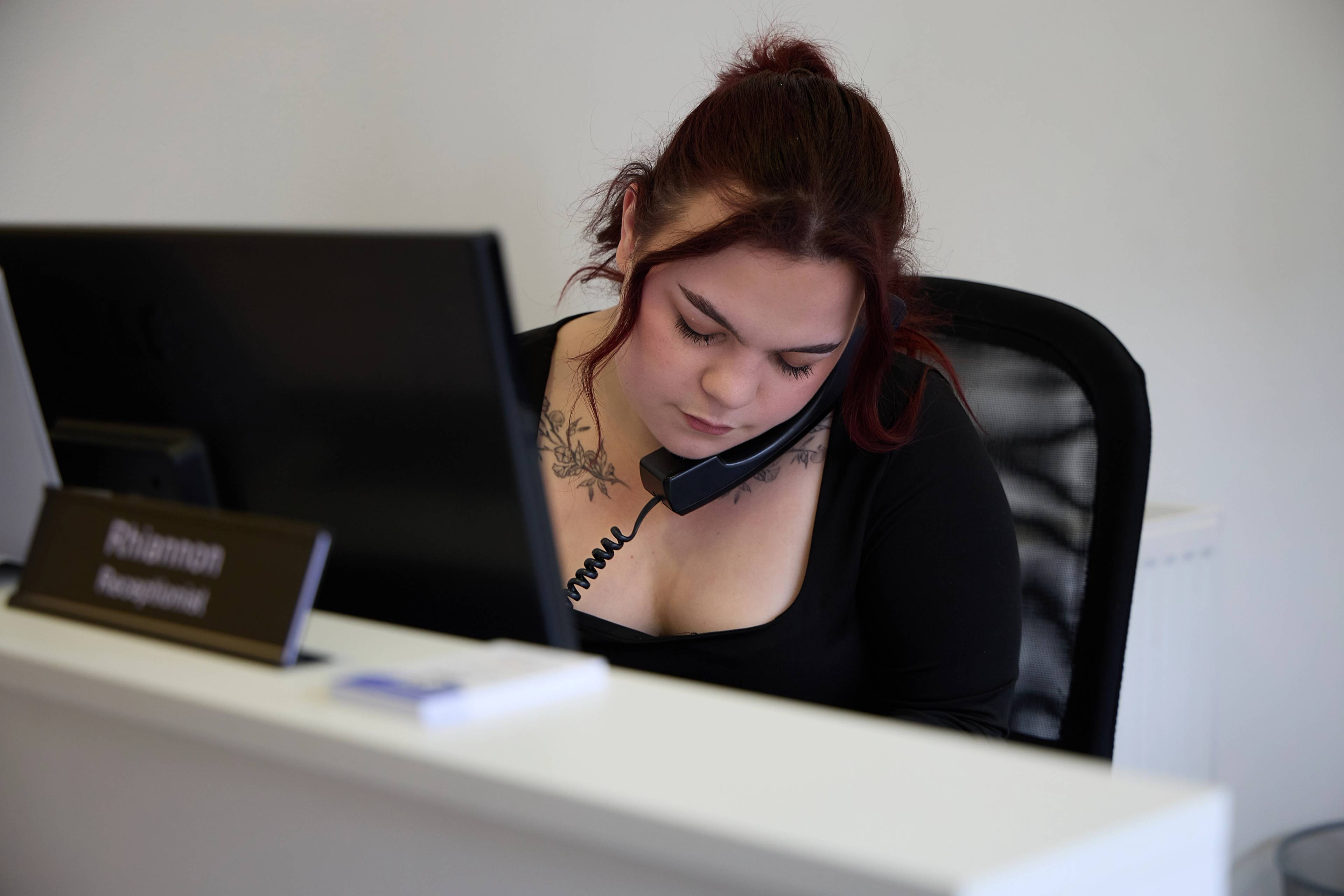 Our receptionist on the phone