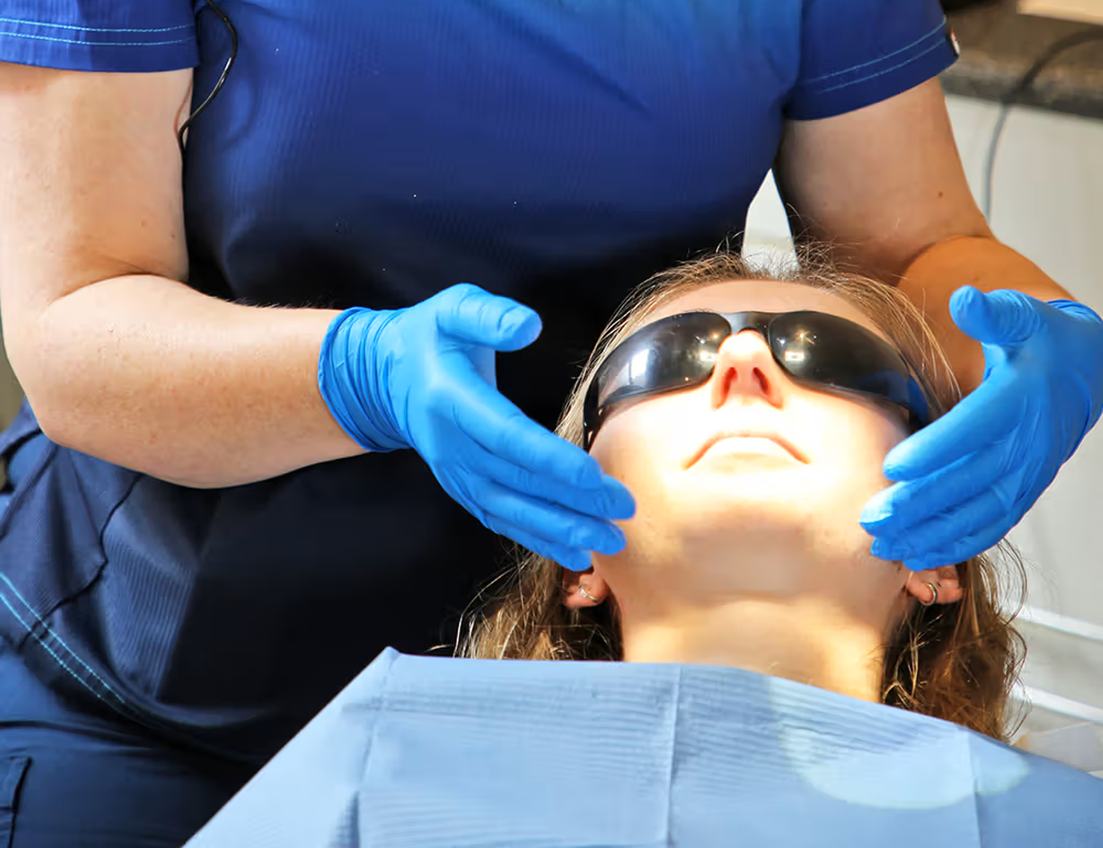 Cathy Barber examining a patient