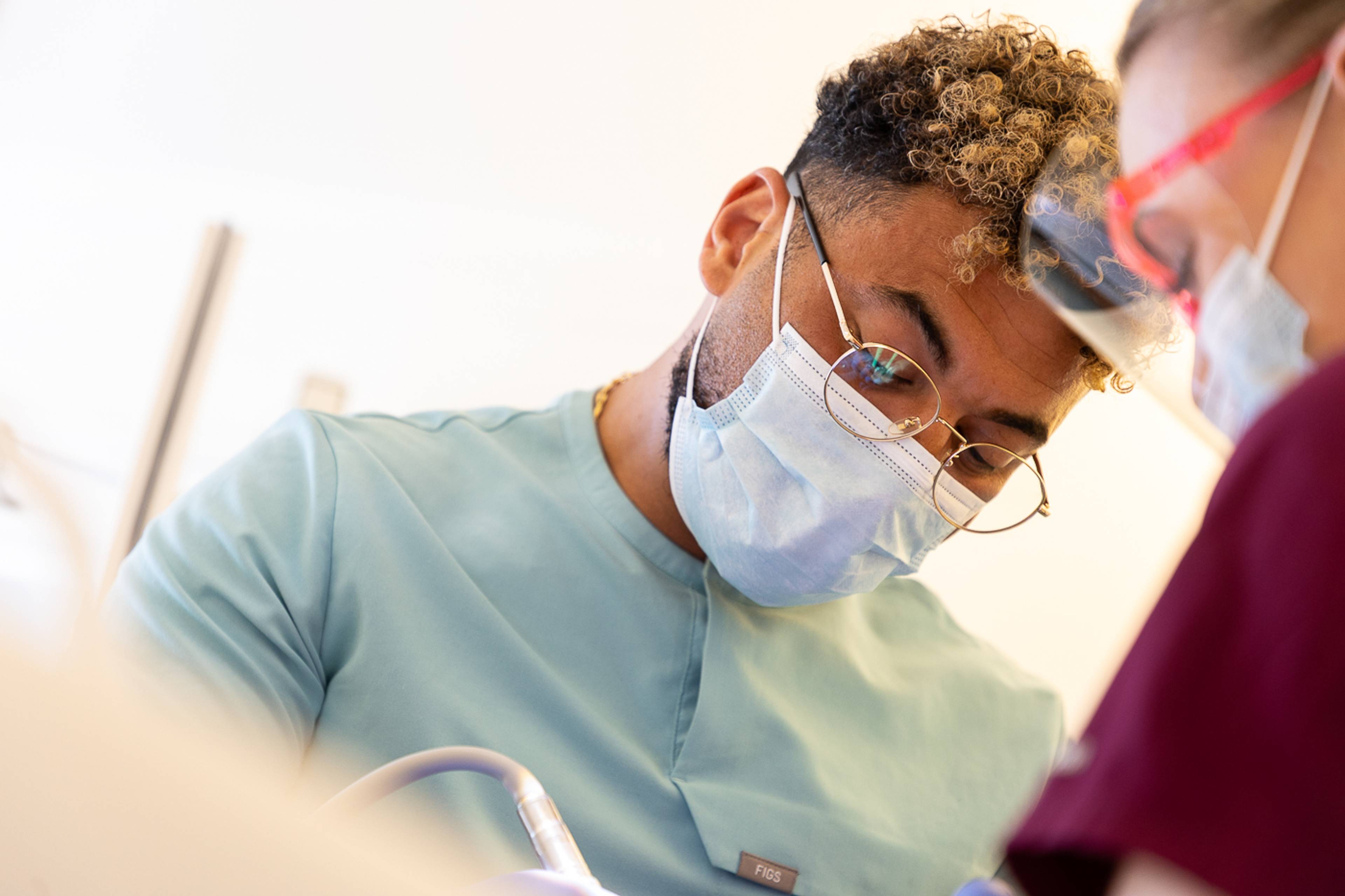 One of our dentists examining a patient